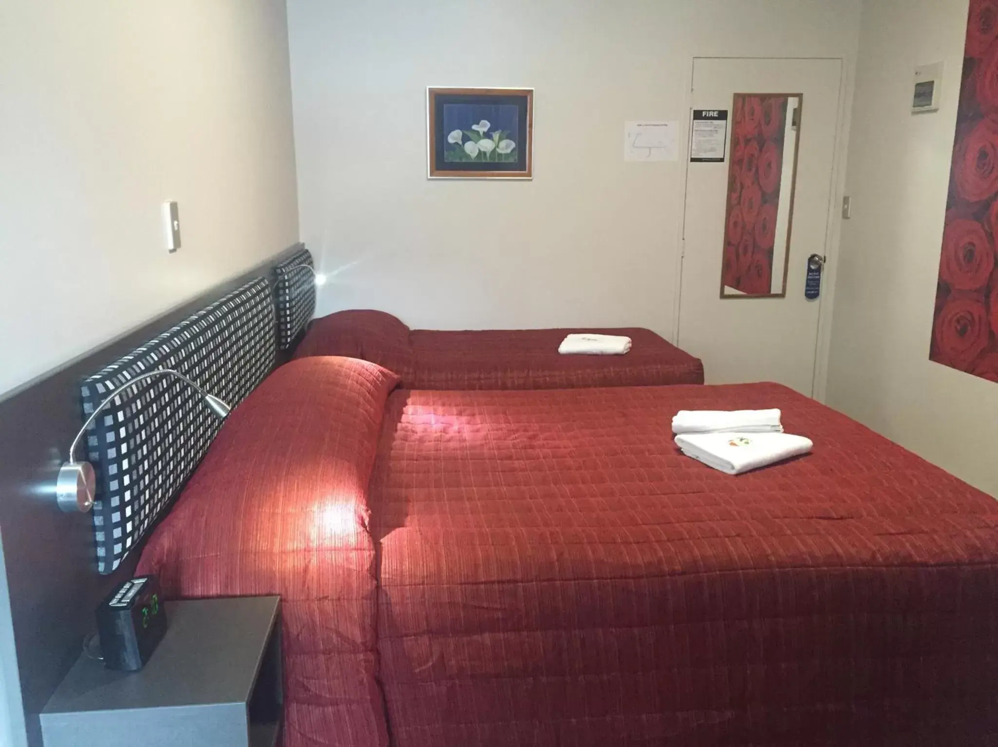 Photo of the whole room, Bed in Motel on Carroll