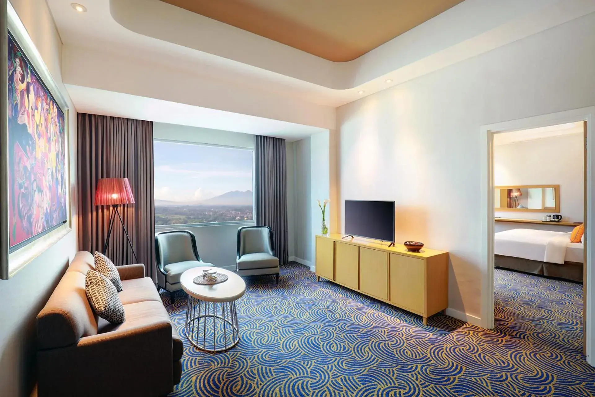 Communal lounge/ TV room, Seating Area in Hotel Ciputra Cibubur managed by Swiss-Belhotel International