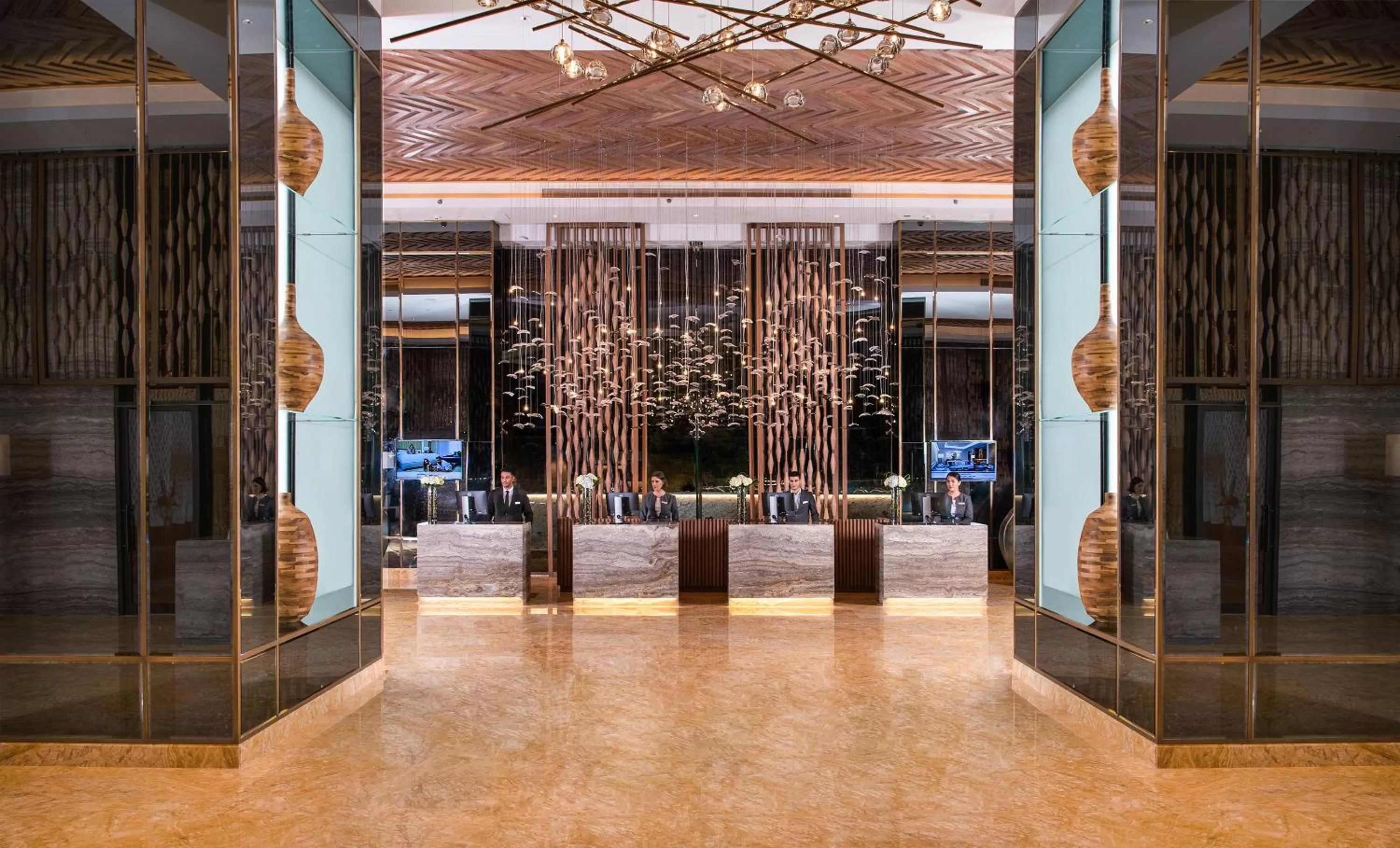 Lobby or reception in Al Jaddaf Rotana Suite Hotel