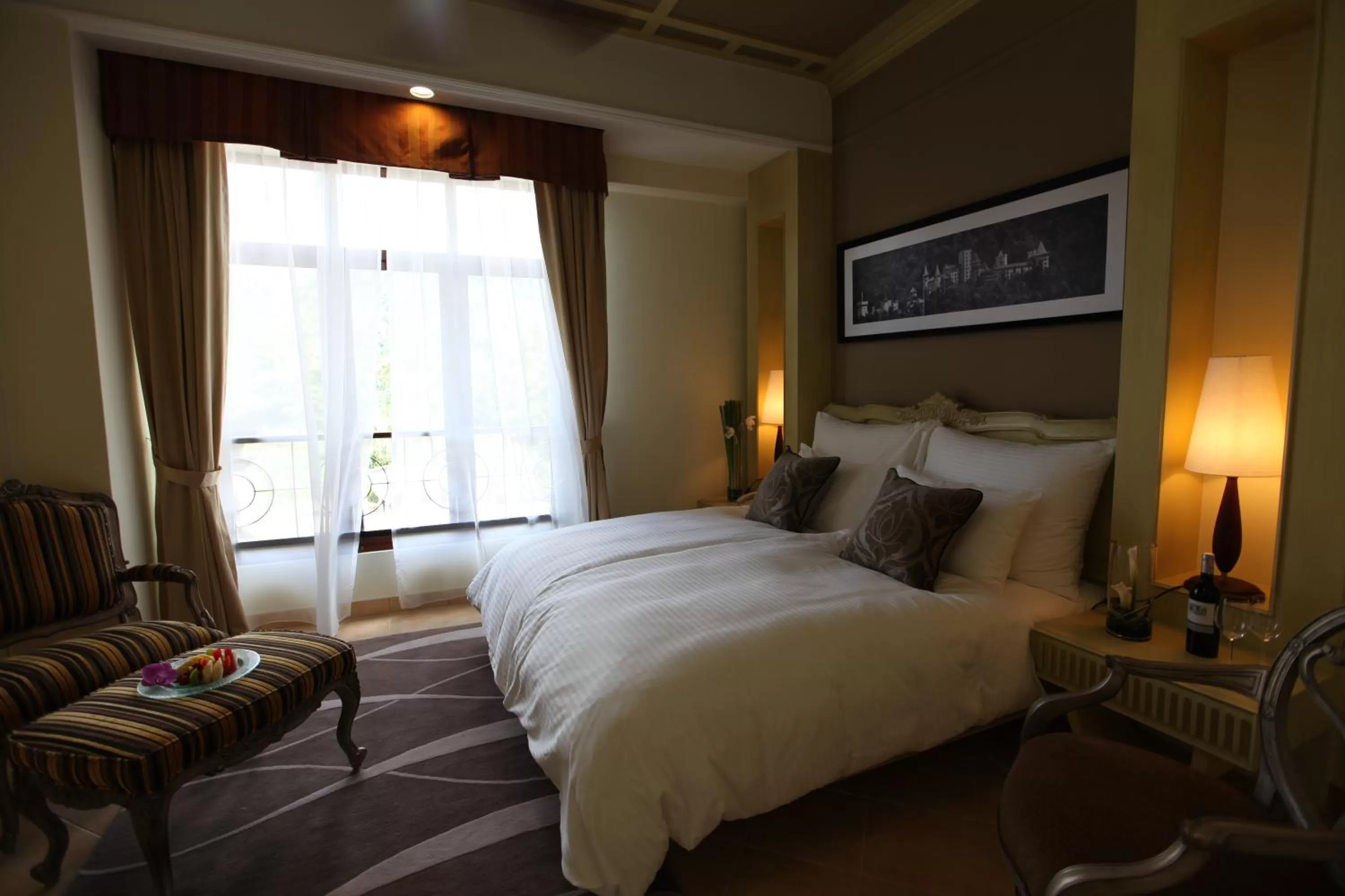 Bed in The Chateau Spa & Wellness Resort