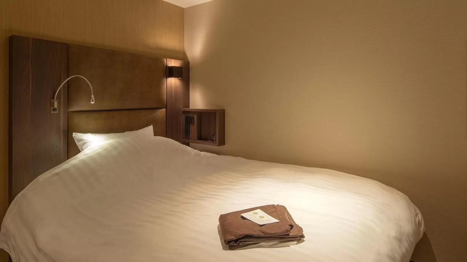 Bed in hotel H2 TRIP&BUSINESS NAGASAKI