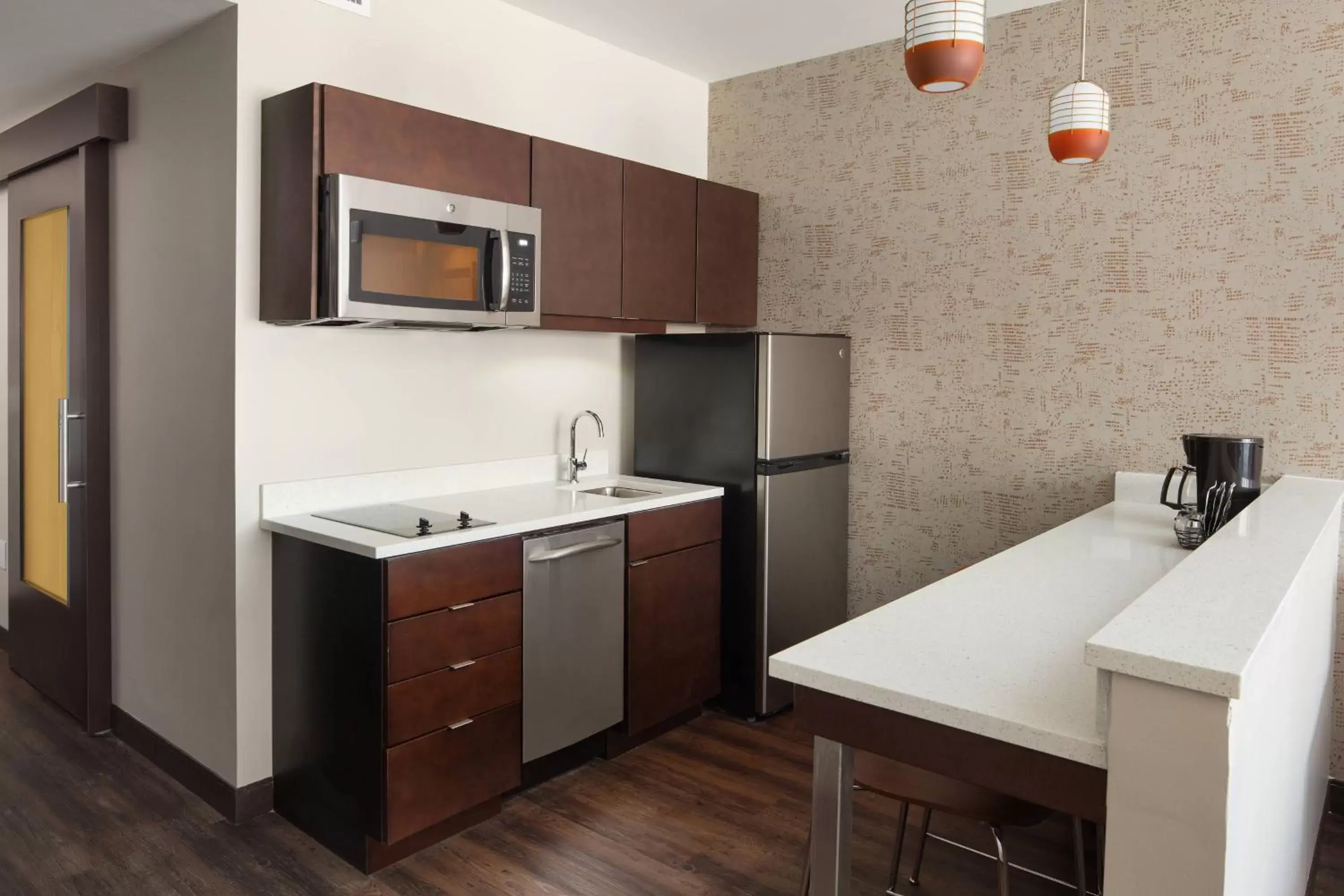 Kitchen or kitchenette, Kitchen/Kitchenette in TownePlace Suites by Marriott New Orleans Downtown/Canal Street