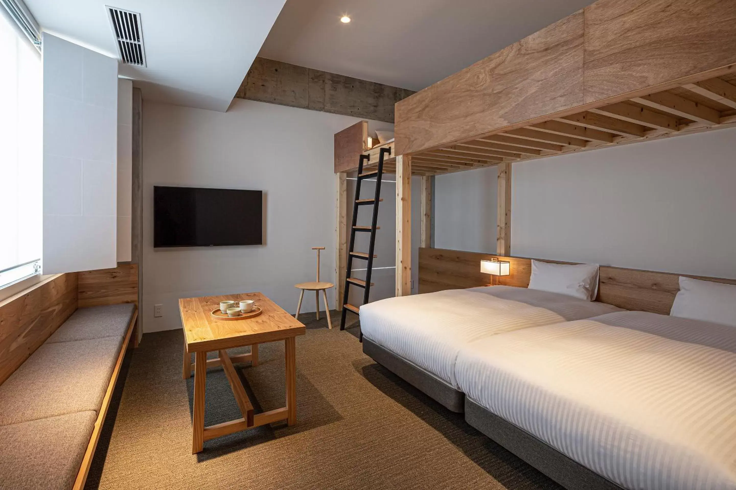 Bedroom in TSUGU Kyoto Sanjo by THE SHARE HOTELS