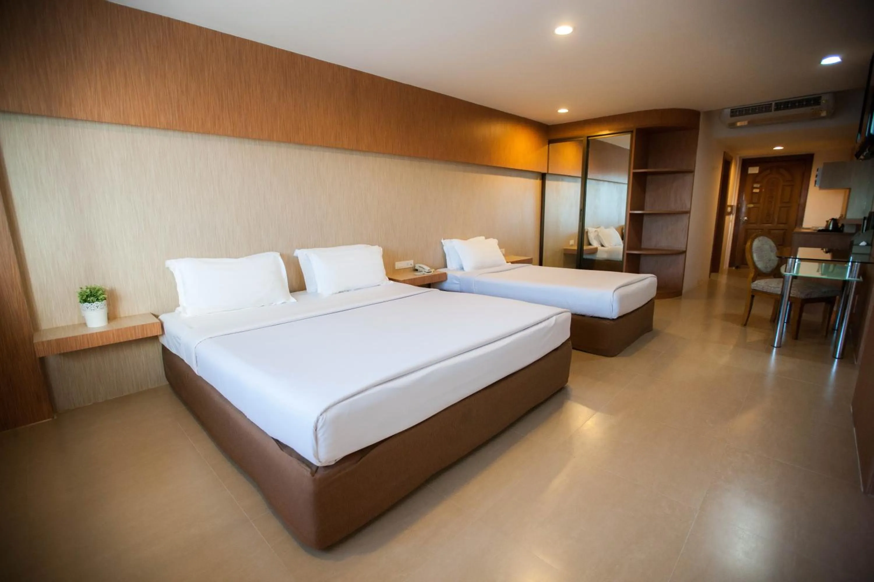 Photo of the whole room, Bed in Golden City Rayong Hotel