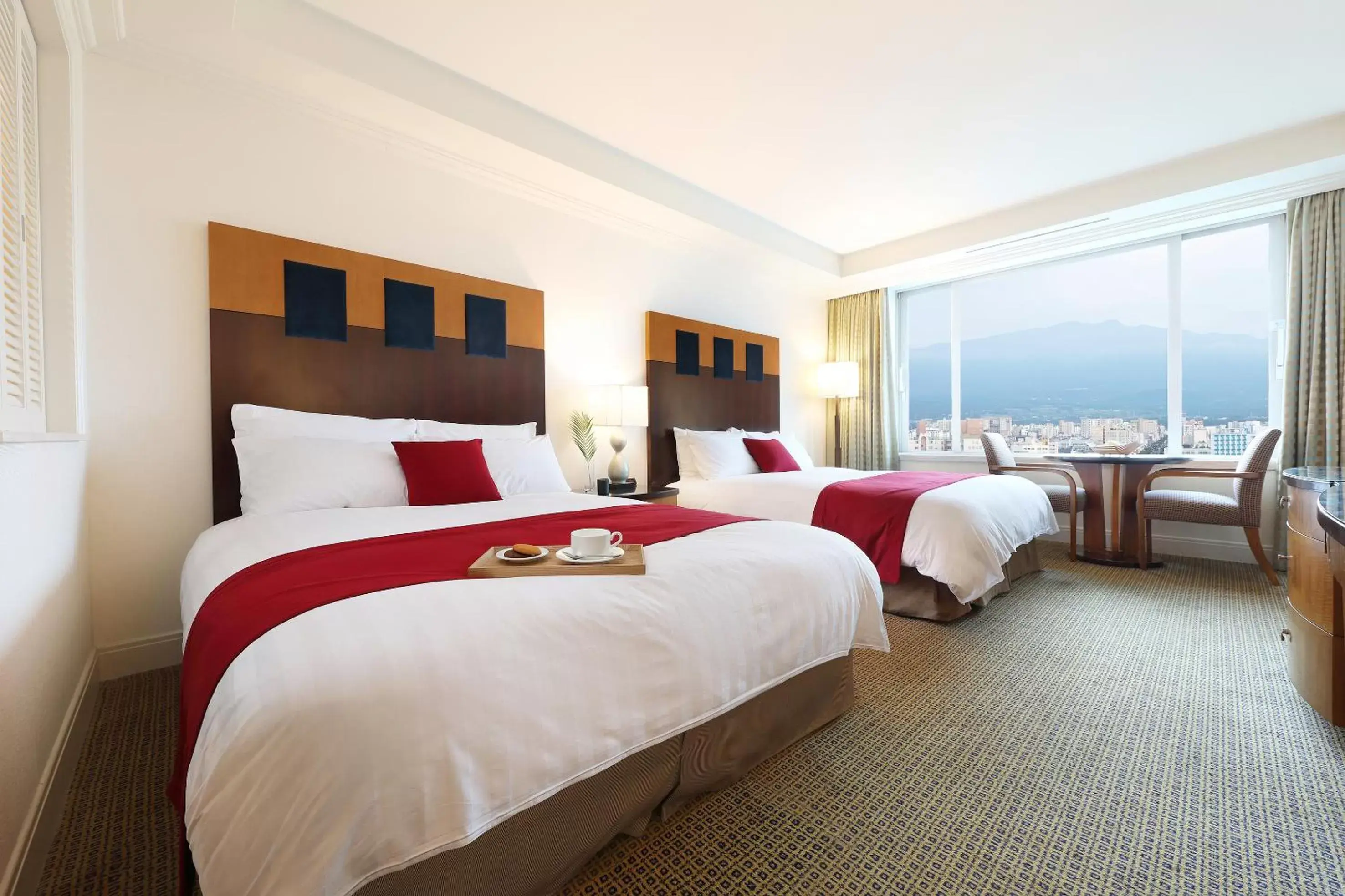 Bedroom in Ramada Plaza by Wyndham Jeju Ocean Front Bedroom in Ramada Plaza by Wyndham Jeju Ocean Front