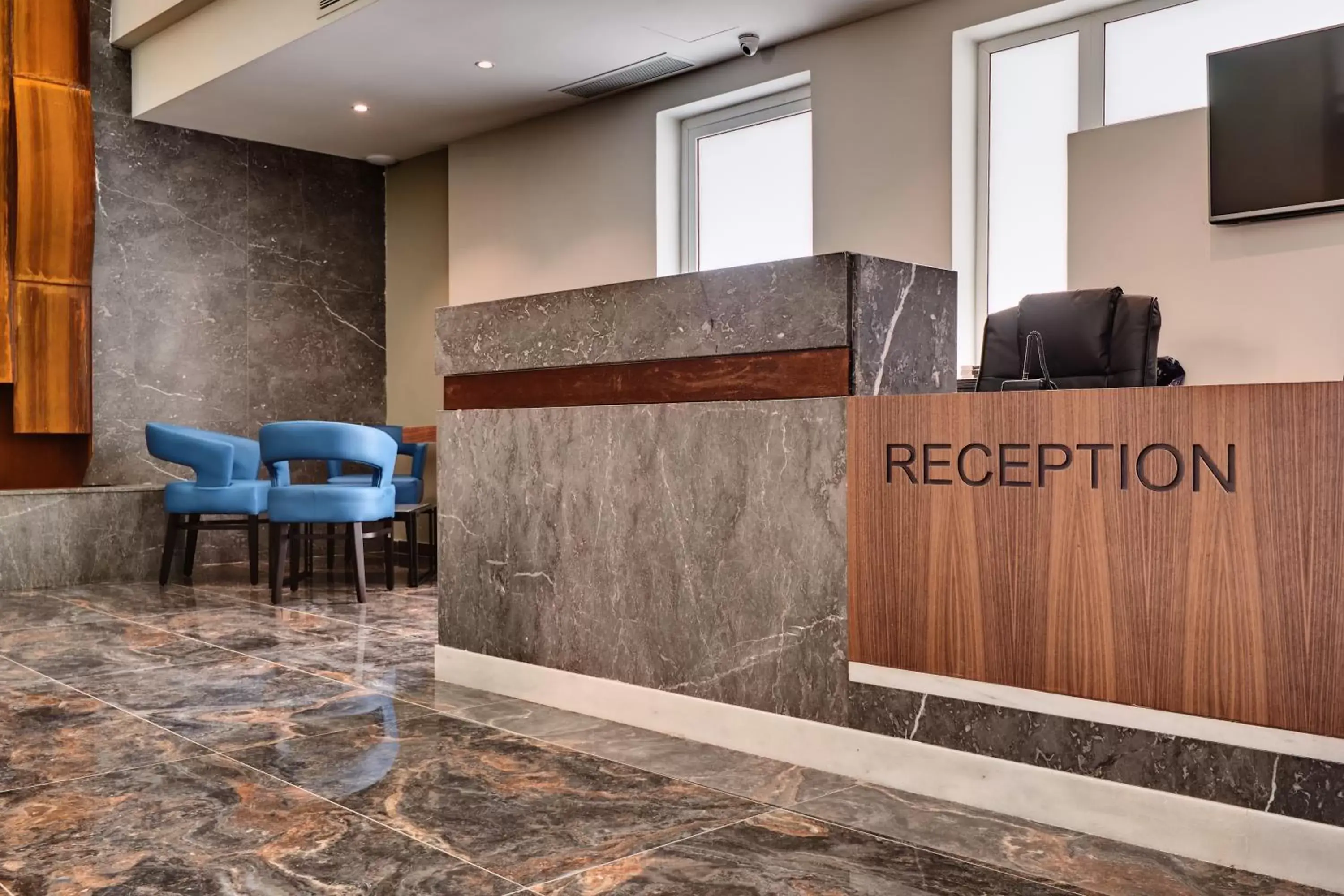 Lobby or reception in The District Hotel