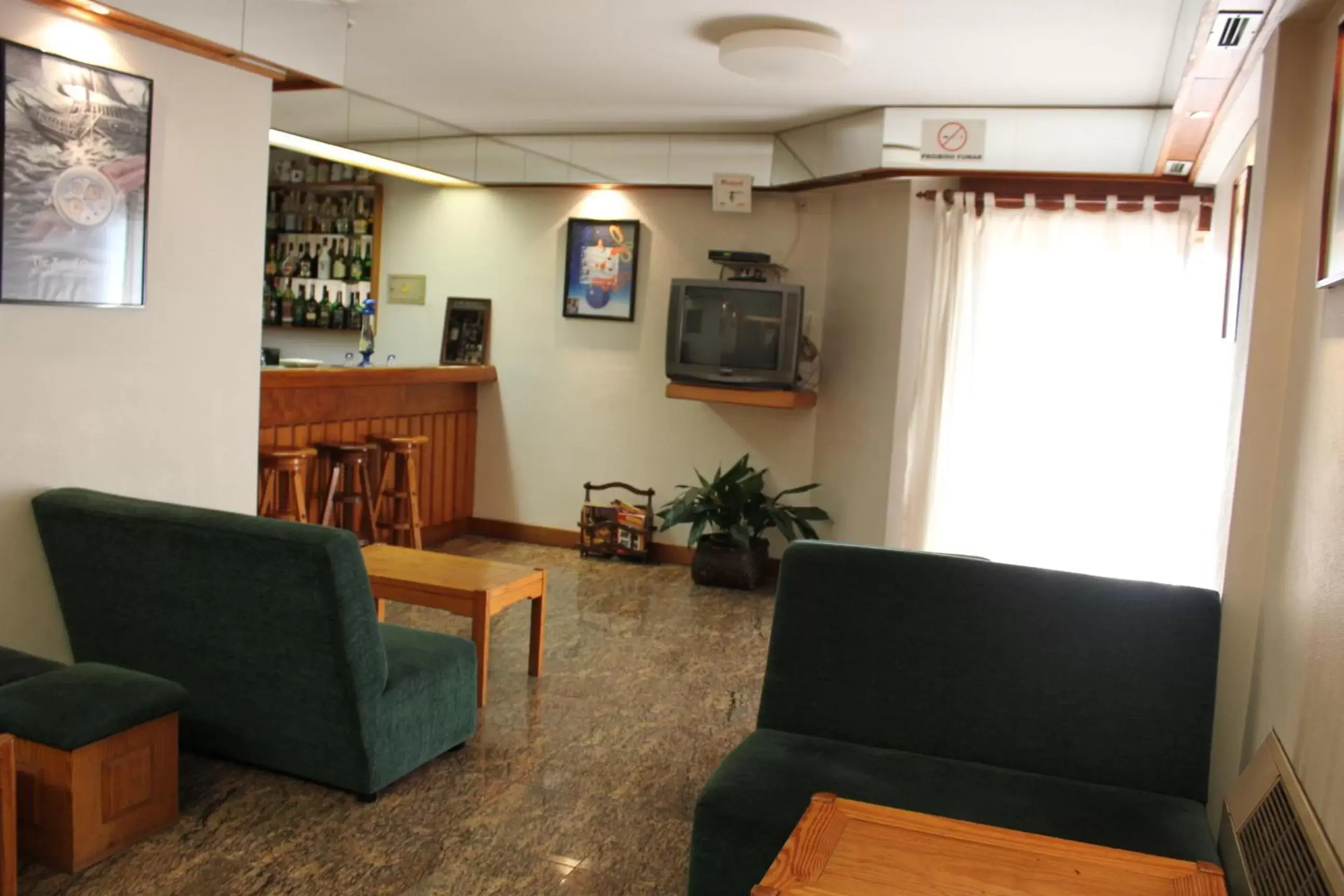 Communal lounge/ TV room, Seating Area in Hotel Bom Sucesso