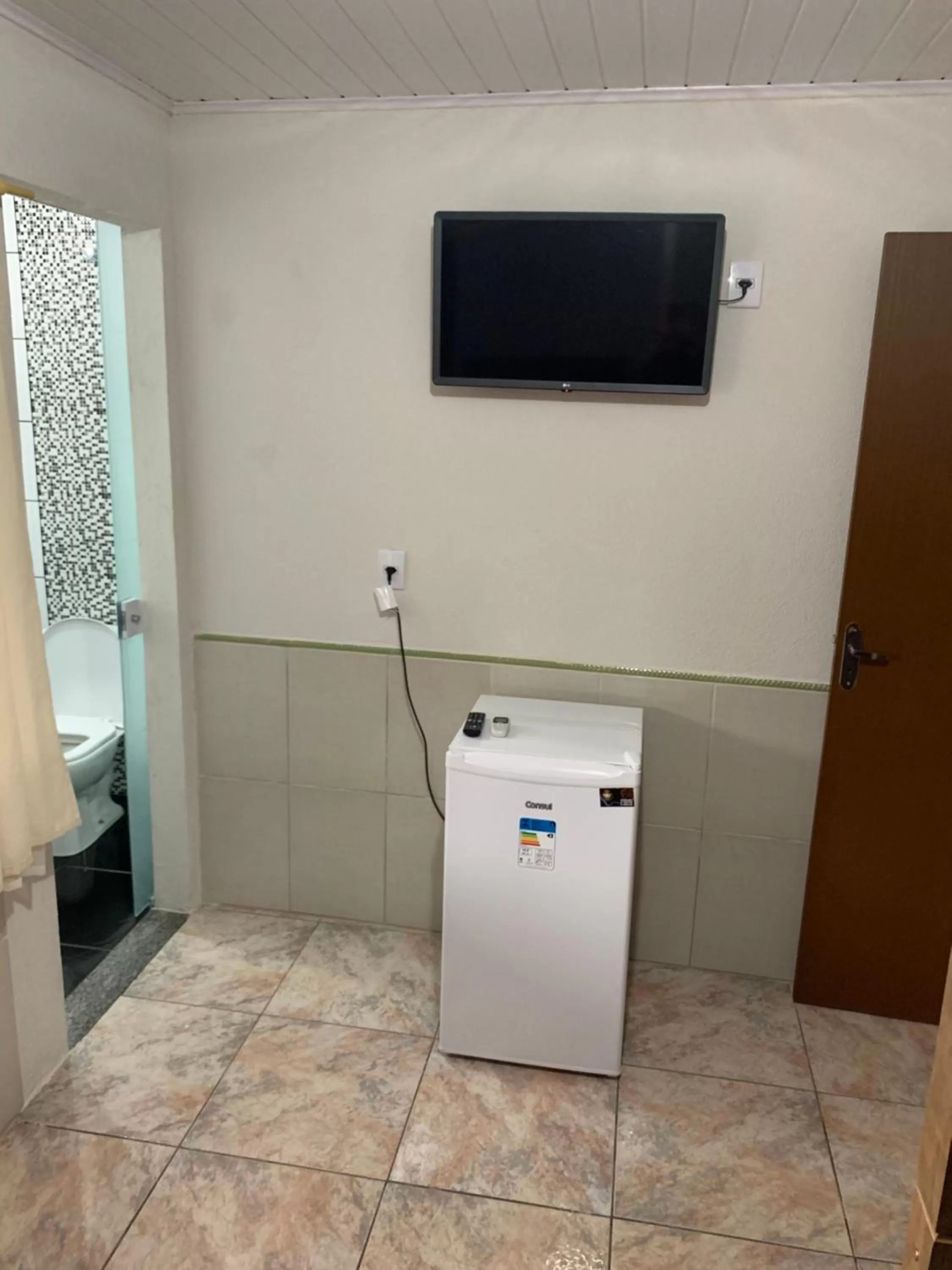 TV and multimedia, TV/Entertainment Center in Pousada Tio Tonho