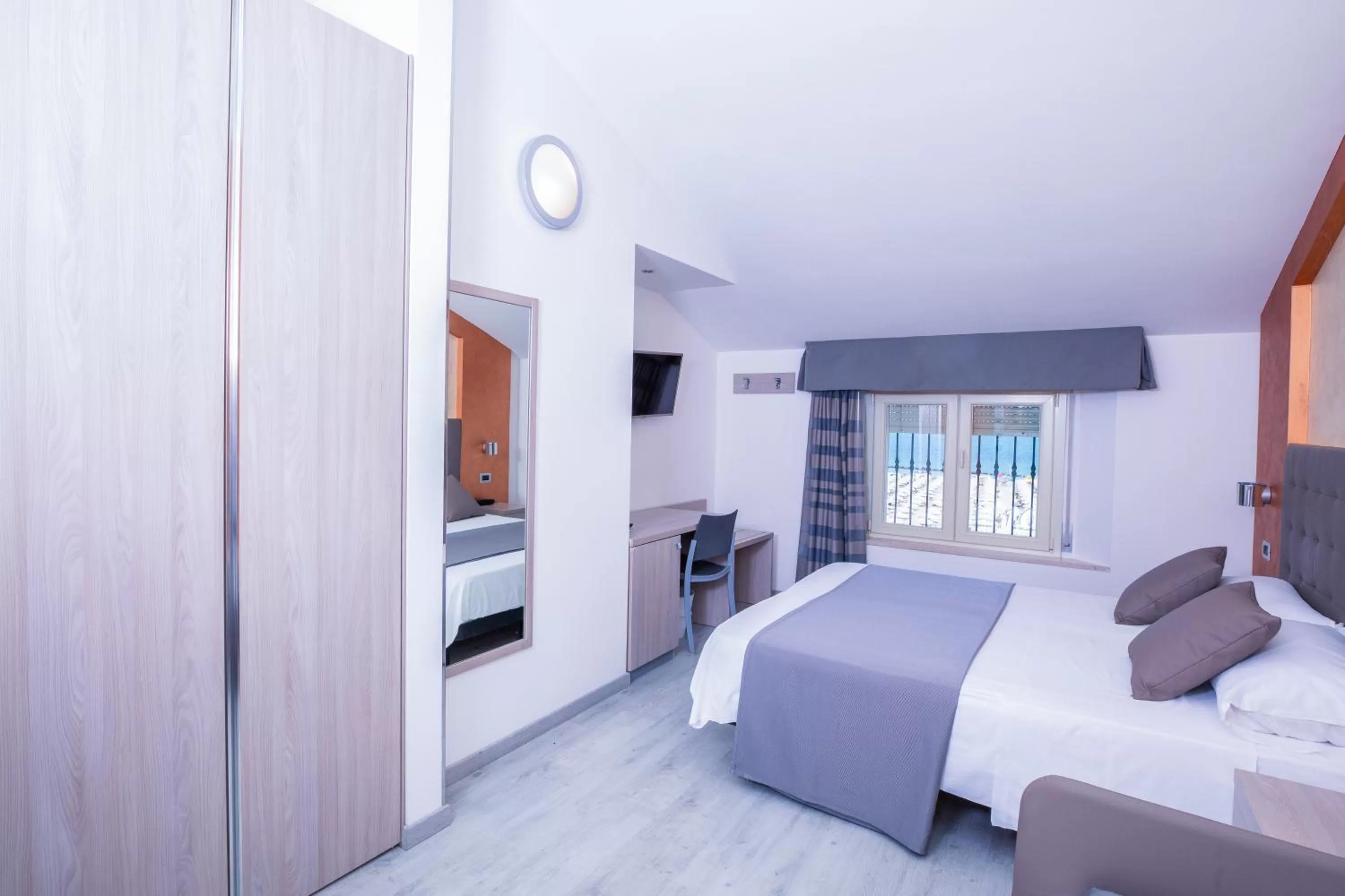 Photo of the whole room, Bed in Hotel Gabbiano