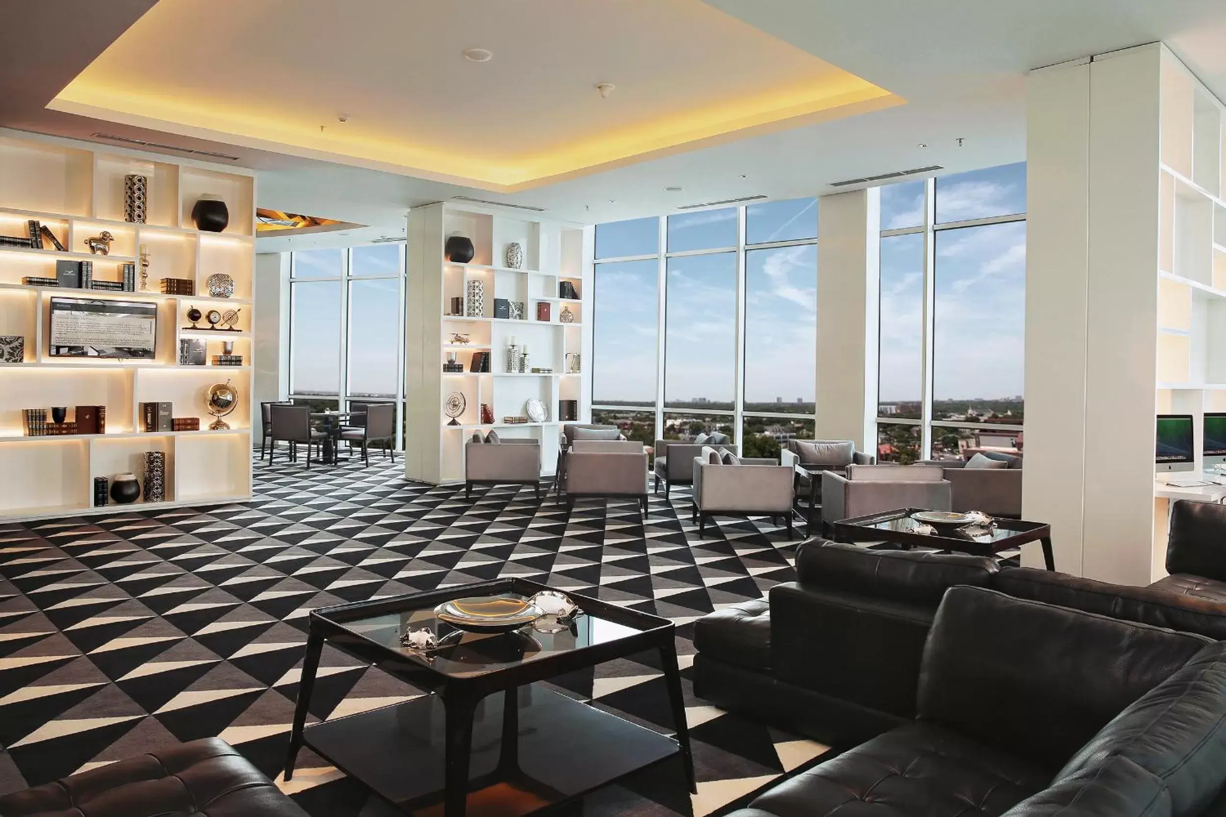 Lobby or reception in Hotel Ciputra World Surabaya managed by Swiss-Belhotel International Lobby or reception in Hotel Ciputra World Surabaya managed by Swiss-Belhotel International