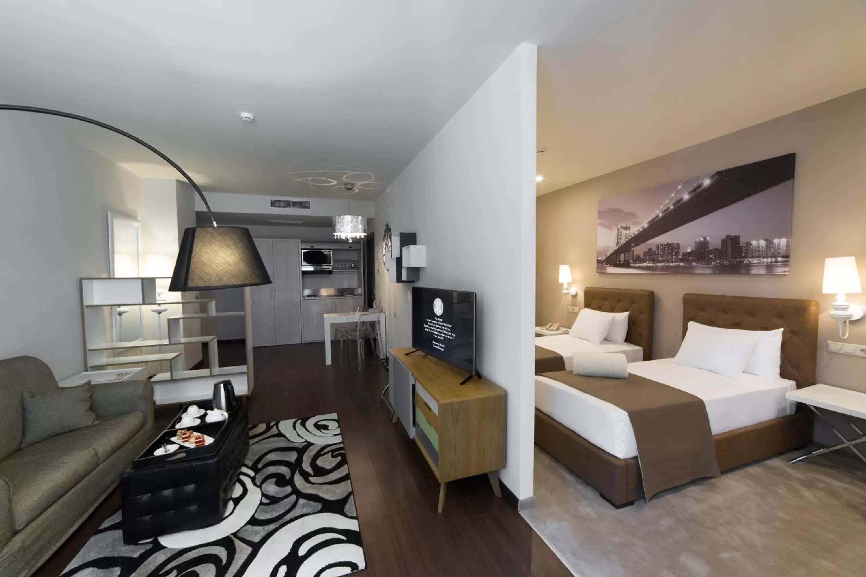 Living room, Bed in Opera Suite Hotel