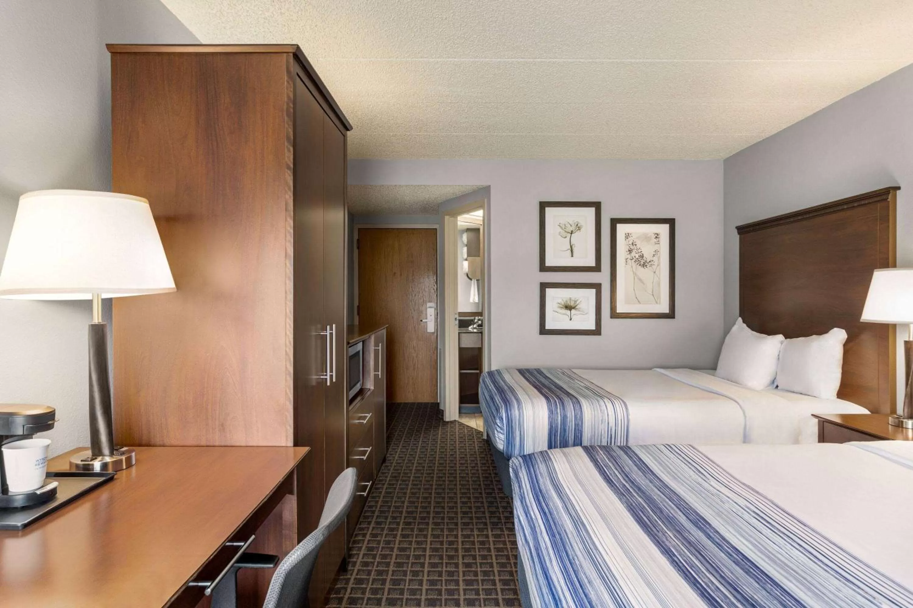 Photo of the whole room, Bed in AmericInn by Wyndham Madison West