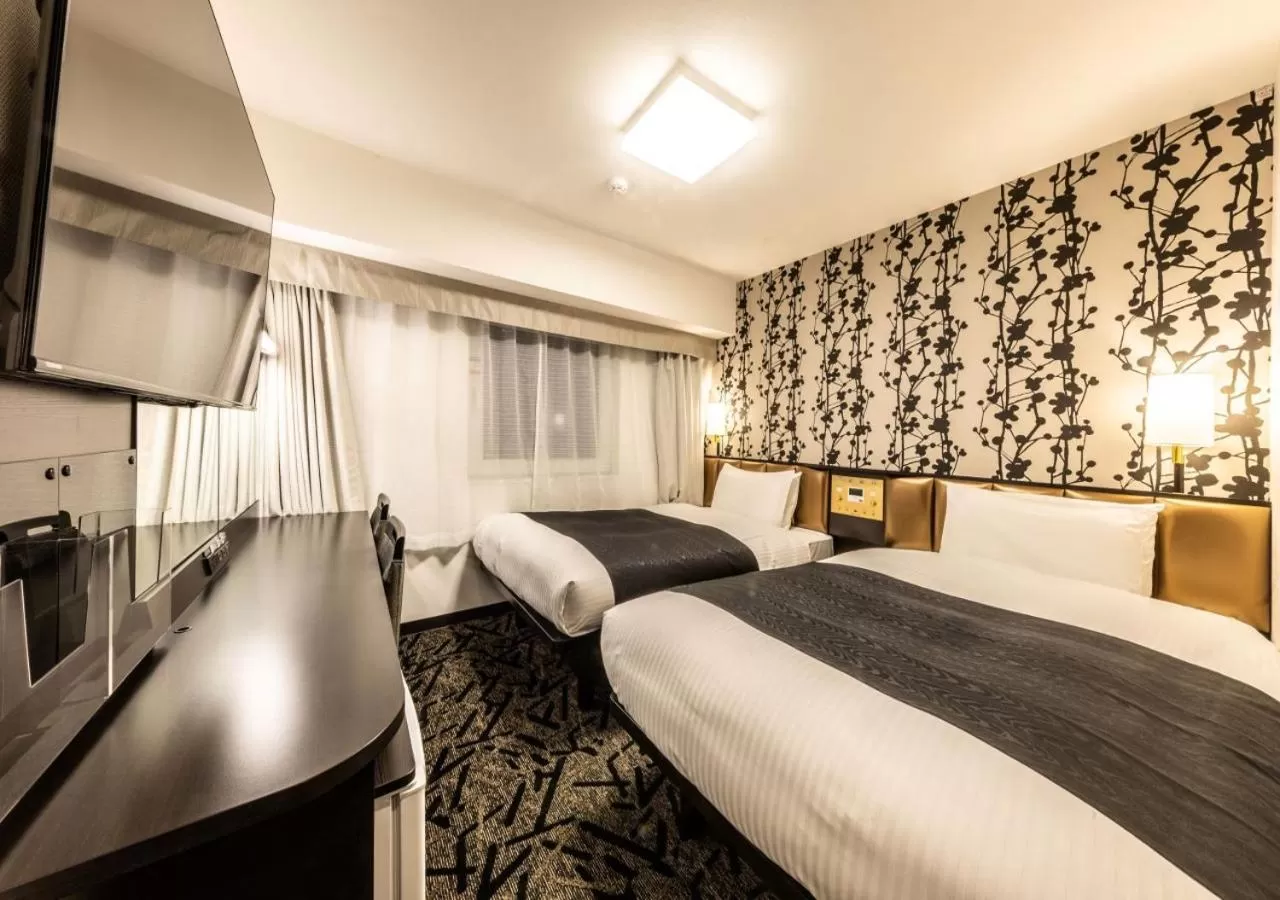 Photo of the whole room, Bed in APA Hotel & Resort Osaka Umeda Eki Tower