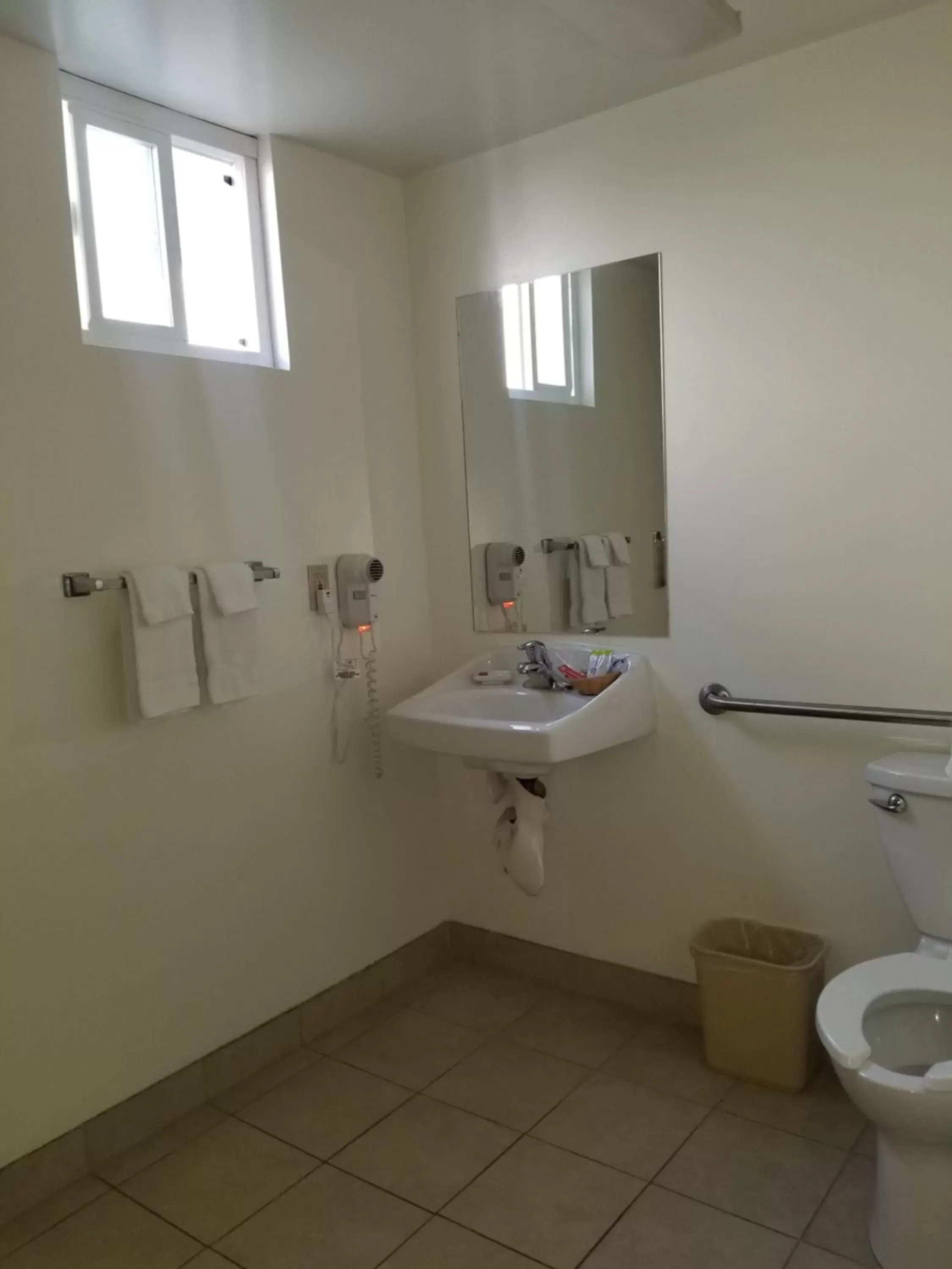 Toilet, Bathroom in Super 8 by Wyndham Los Angeles-Culver City Area