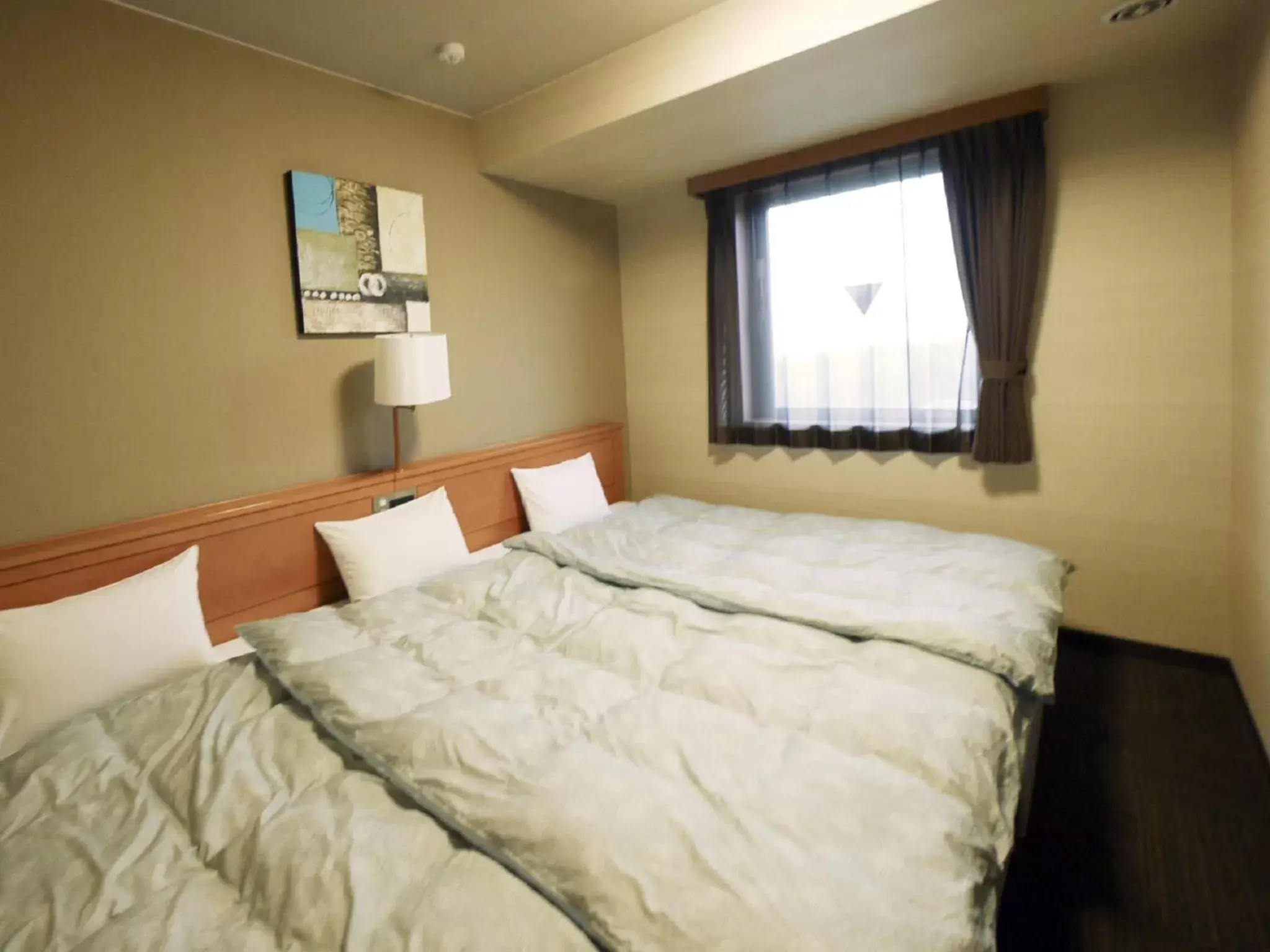 Photo of the whole room, Bed in Hotel Route-Inn Yonezawa Ekihigashi