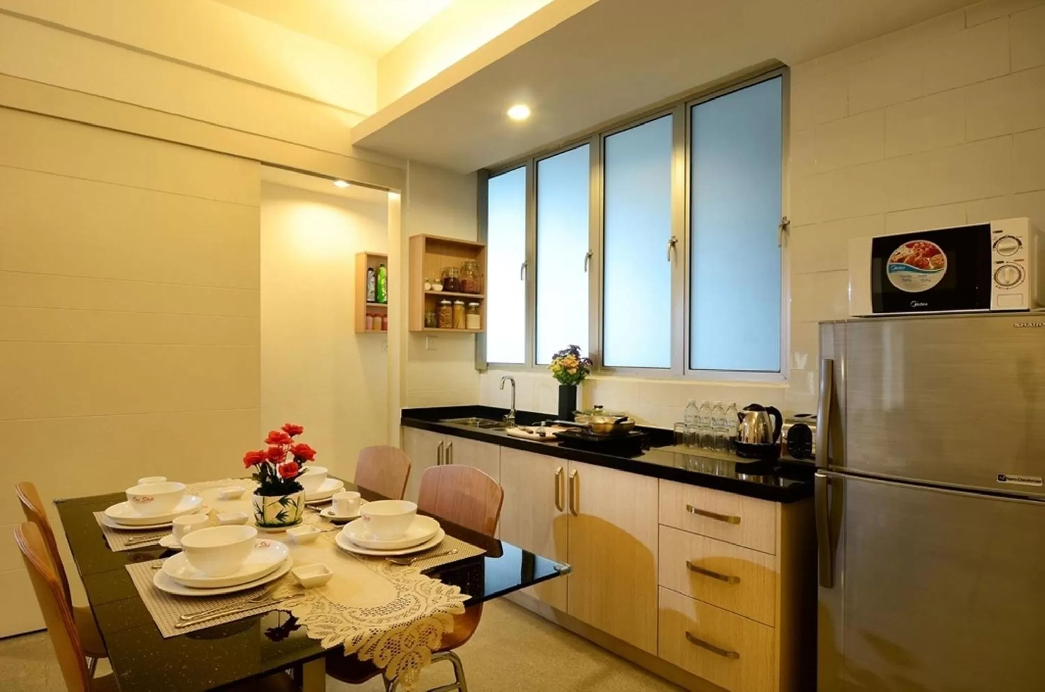Kitchen or kitchenette in One-Stop Residence & Hotel
