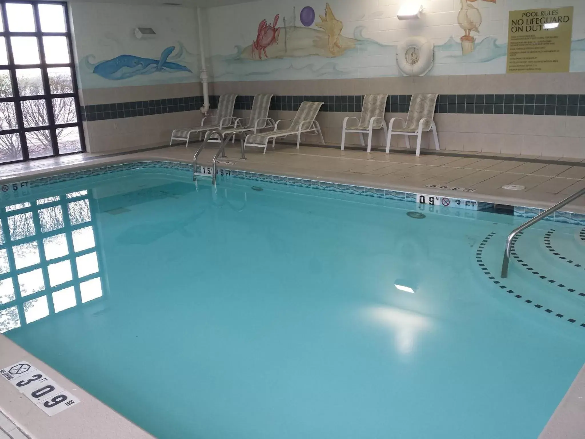 Swimming Pool in Holiday Inn Express Hotel & Suites Cincinnati Northeast-Milford, an IHG Hotel