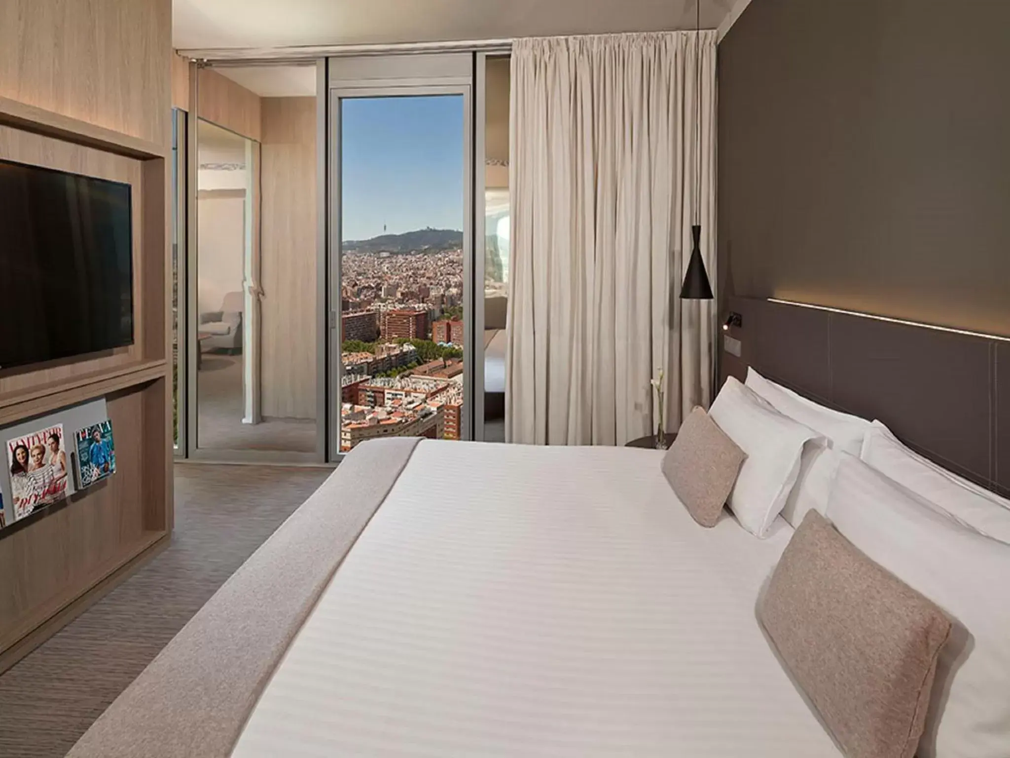 Photo of the whole room, Bed in The Level at Melia Barcelona Sky