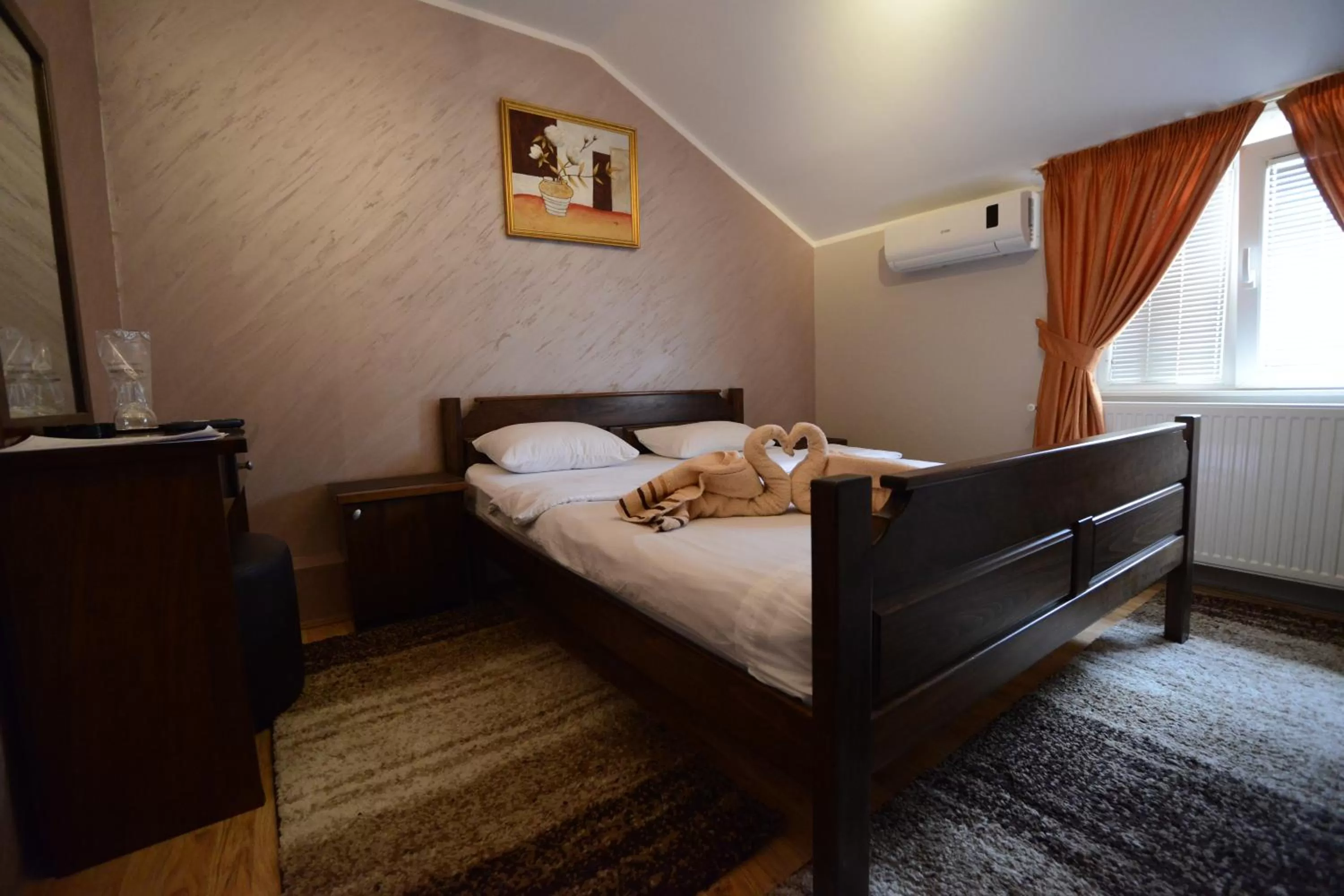 Bed in Garni Hotel Kaća