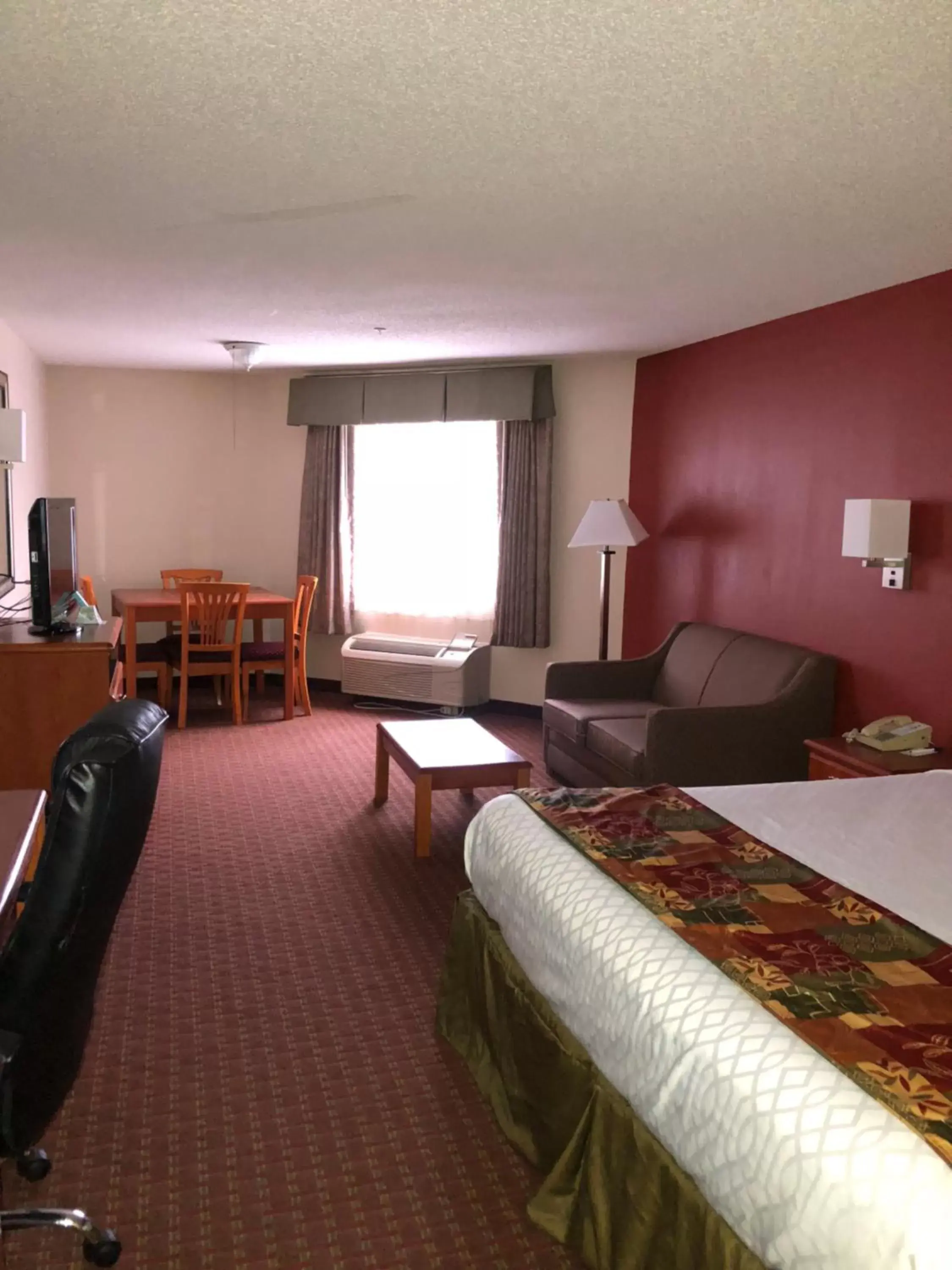 Bed in Millennium Inn Bed in Millennium Inn