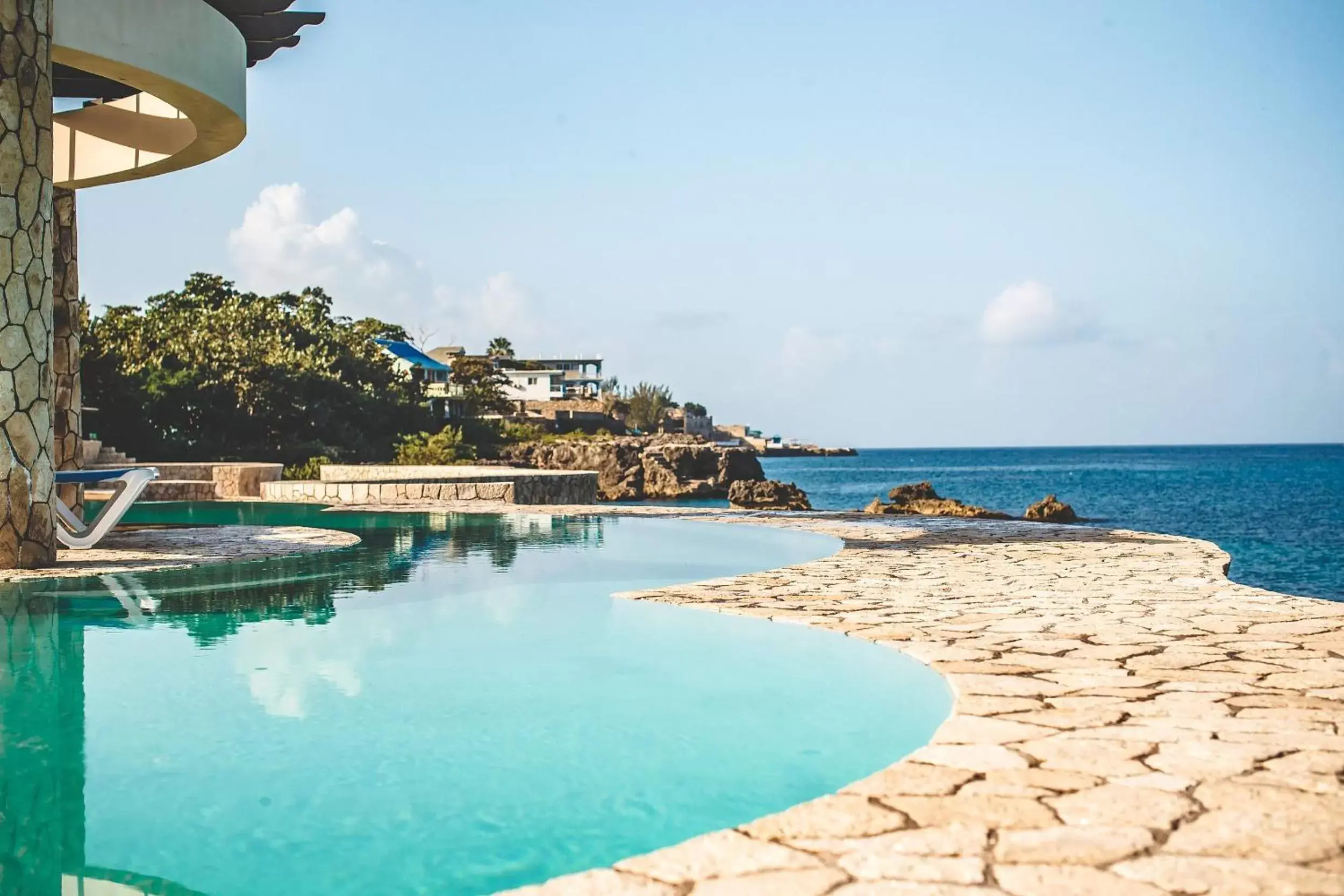 Swimming pool in Ocean Cliff Hotel Negril Limited