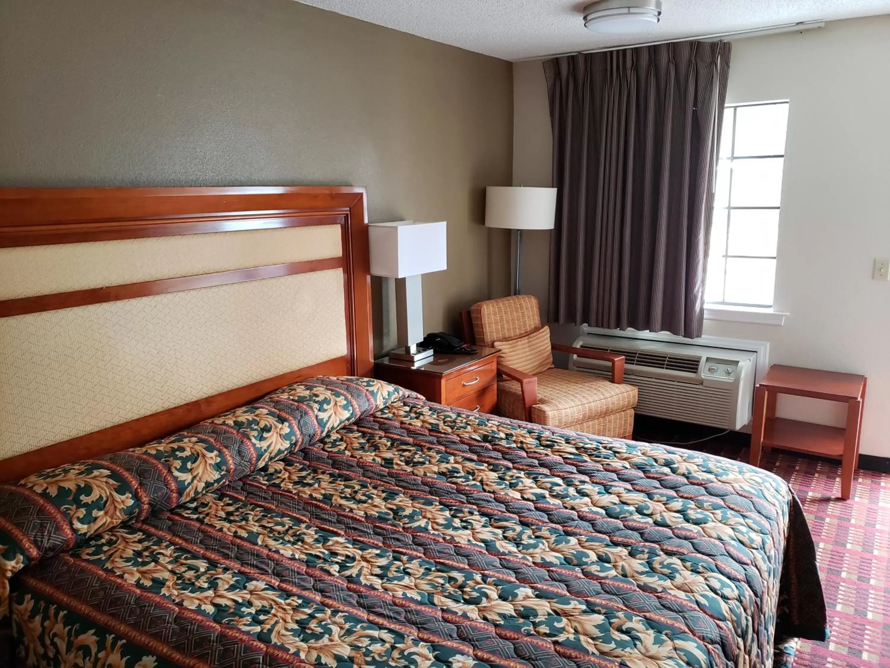 Bed in Peach Tree Inn Bed in Peach Tree Inn