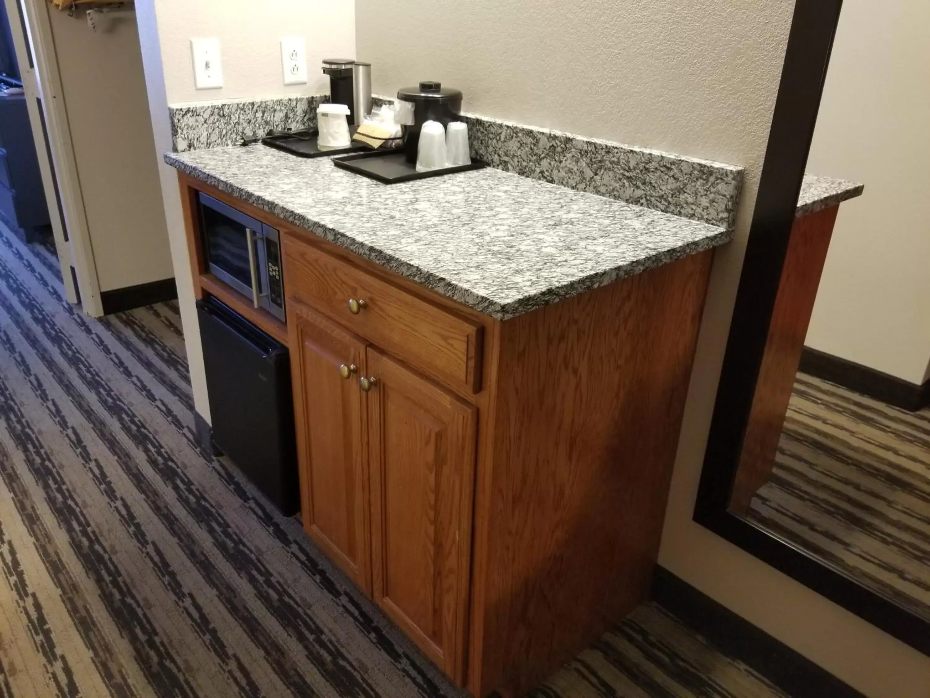 Bedroom, Kitchen/Kitchenette in Country Inn & Suites by Radisson, Nashville Airport East, TN