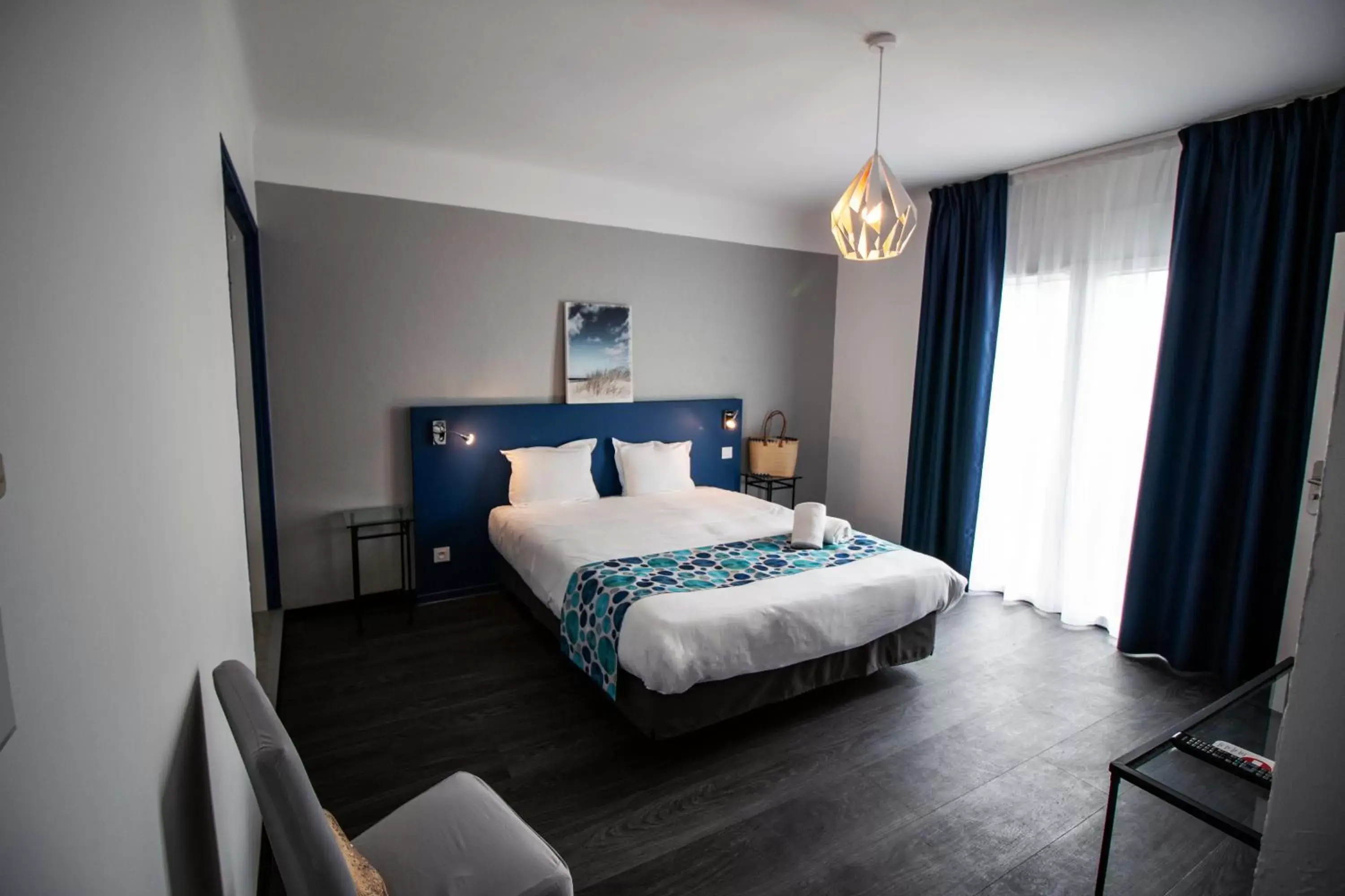 Bedroom in Hôtel Bel Azur
