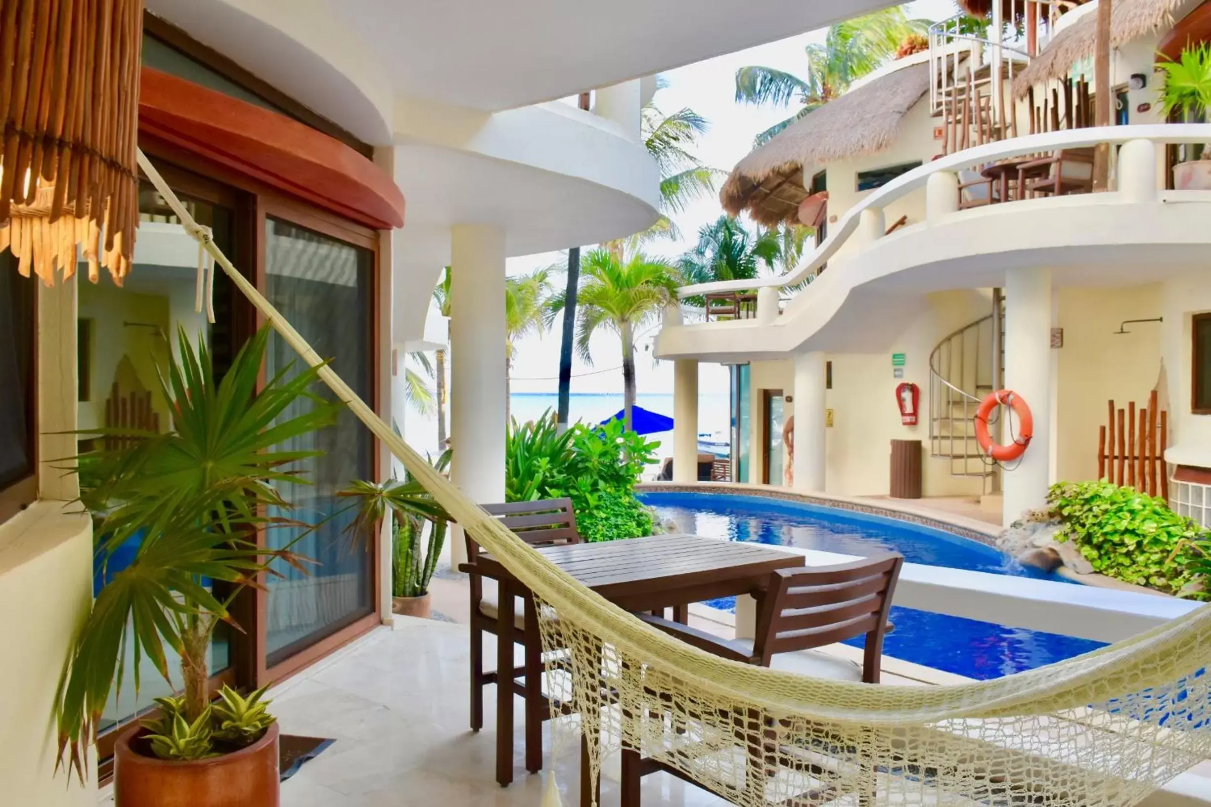 Patio, Swimming Pool in Playa Palms Beach Hotel