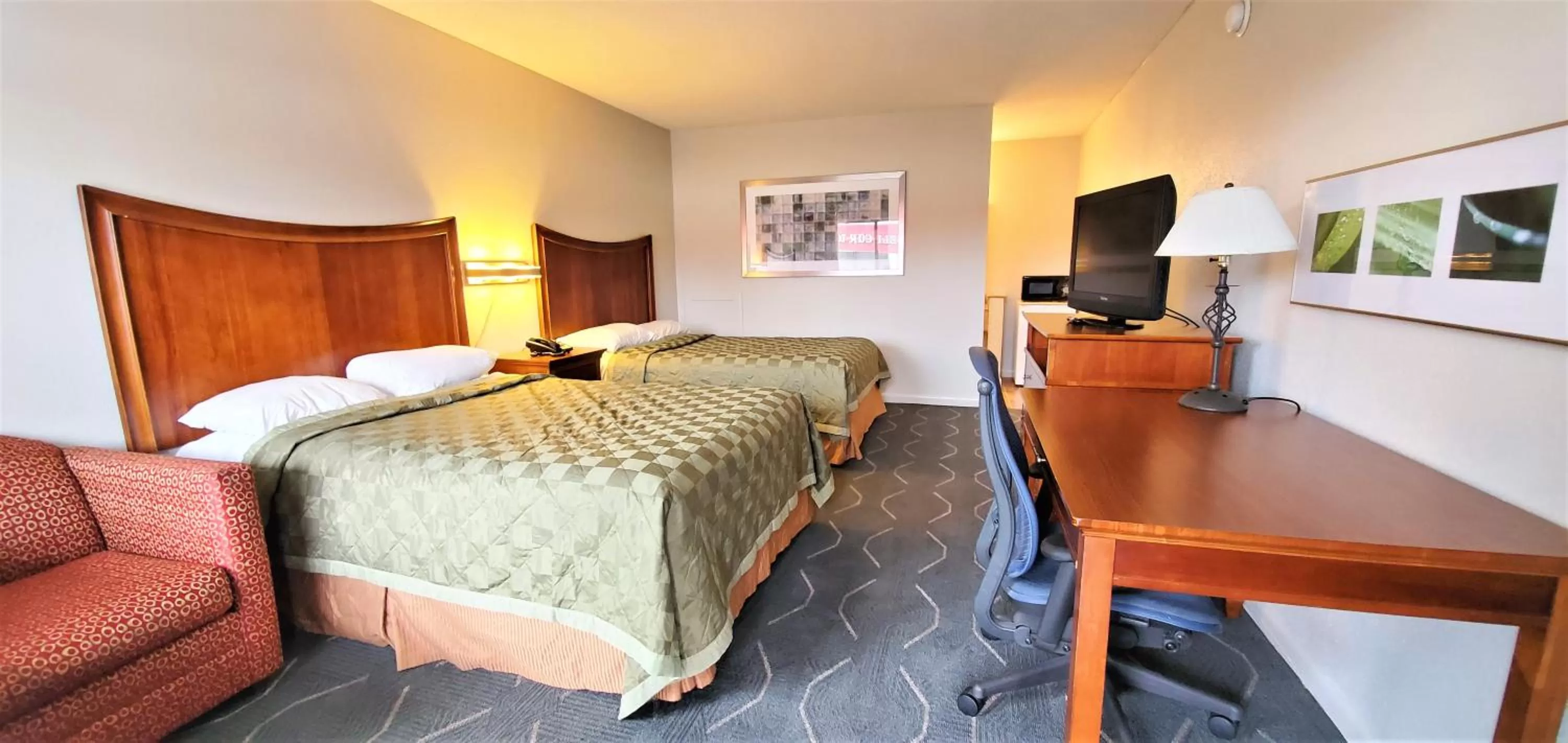 Photo of the whole room, Bed in Economy 7 Inn- Newport News