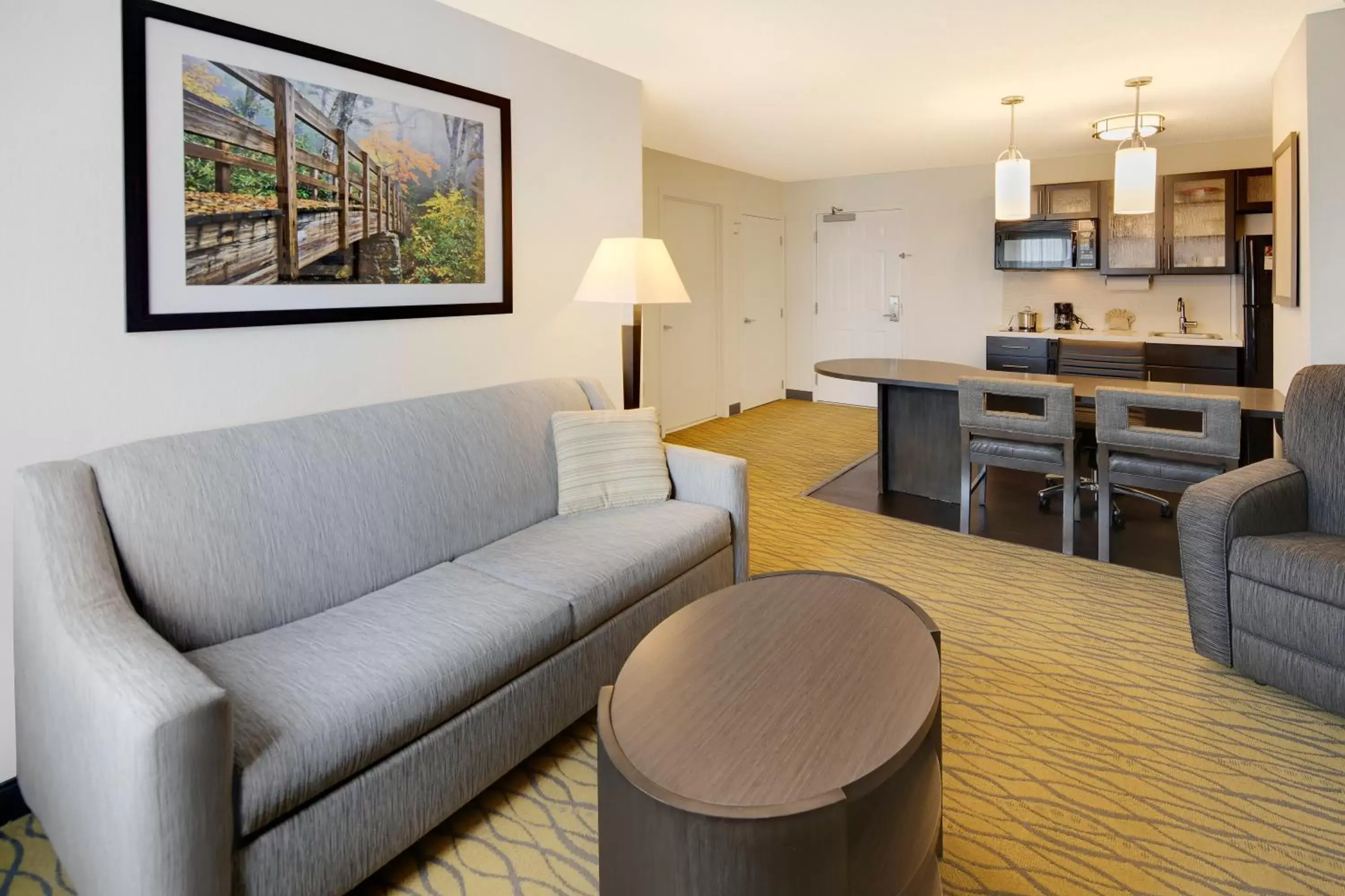 Photo of the whole room, Seating Area in Candlewood Suites Rogers-Bentonville, an IHG Hotel