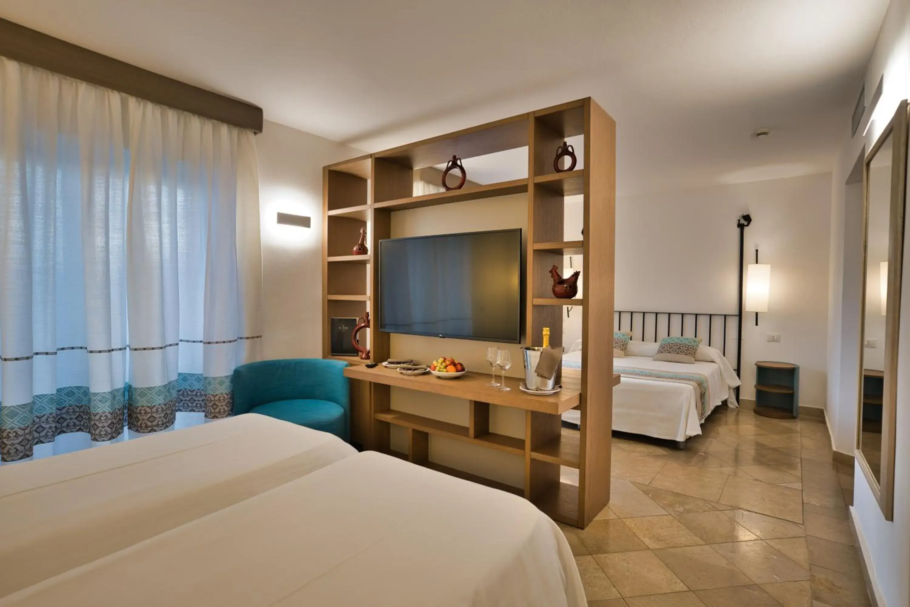 Bed in El Faro Hotel & Spa