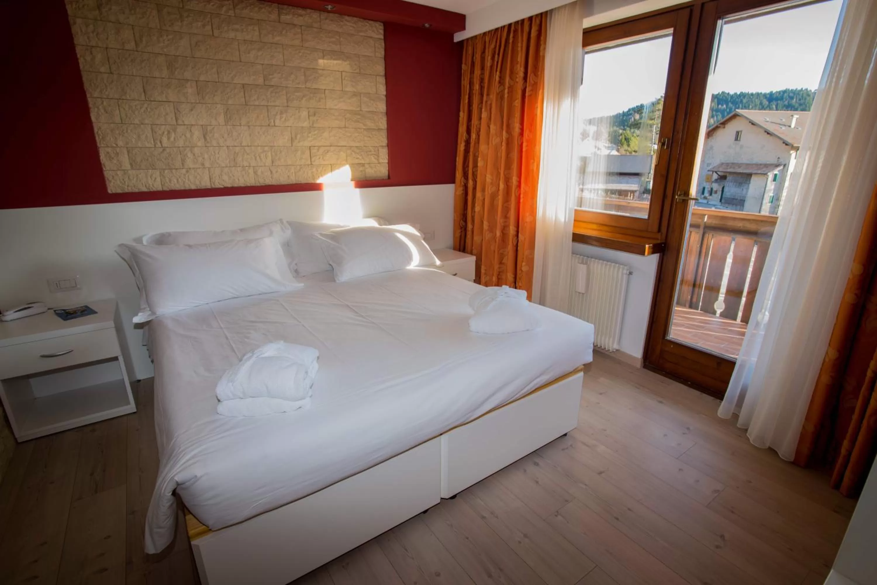 Bed in Hotel Villaggio Nevada