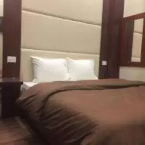 Bed in Grand Palace Hotel Bed in Grand Palace Hotel