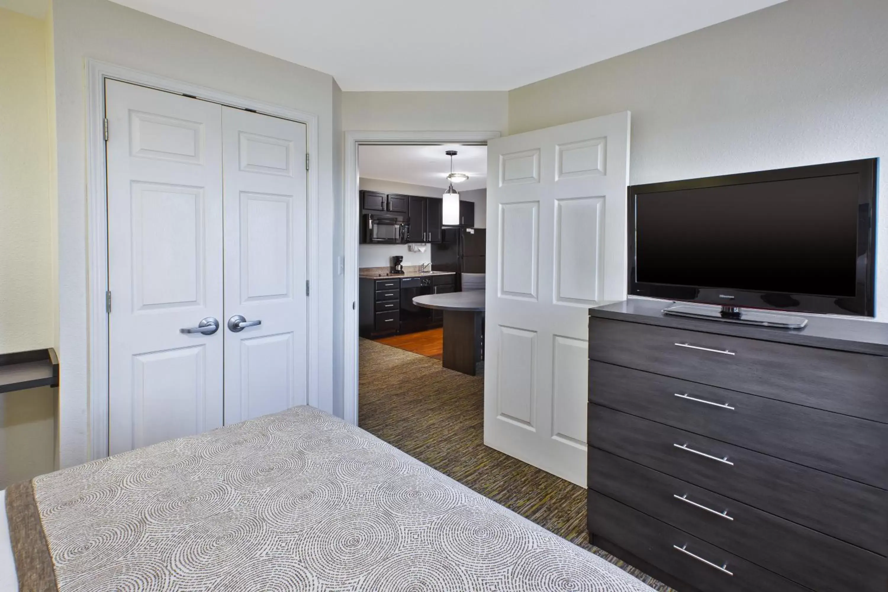 Photo of the whole room, TV/Entertainment Center in Candlewood Suites Indianapolis Airport, an IHG Hotel