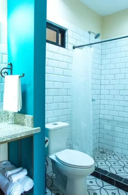 Bathroom in La Fortuna Lodge by Treebu Hotels