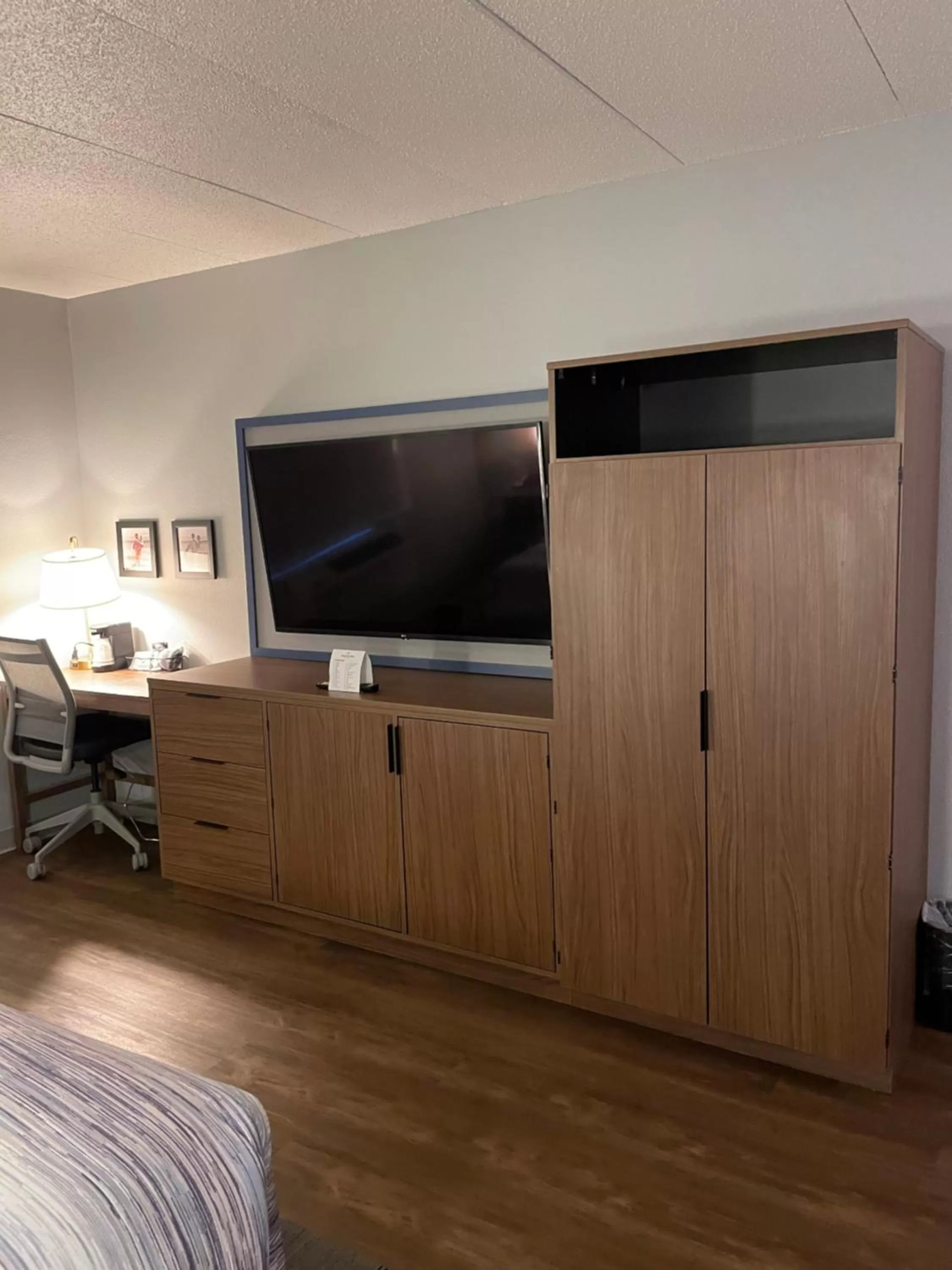 Communal lounge/ TV room, Bed in AmericInn by Wyndham Rapid City