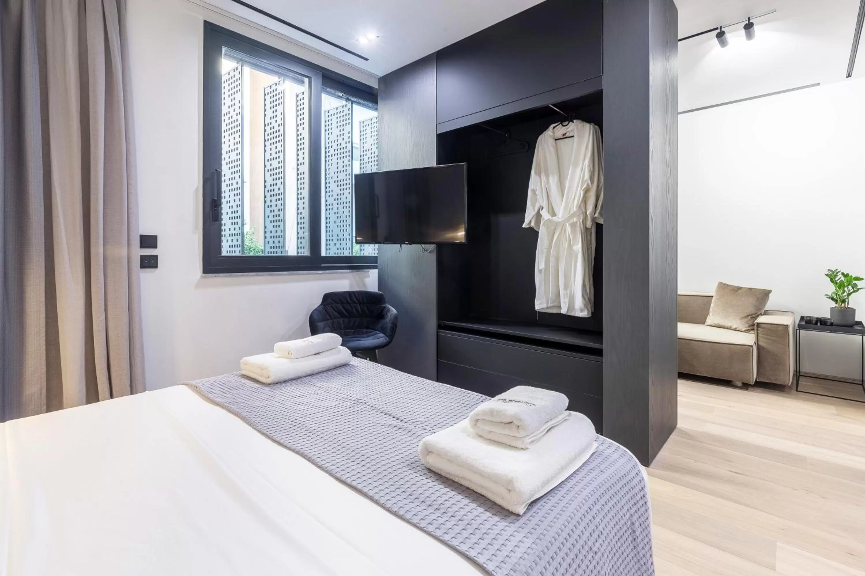 Bed in The Duke Boutique Suites