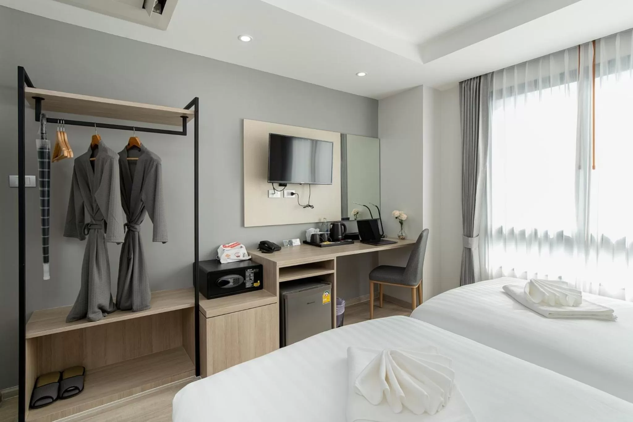 Bed in The Riski Hotel at Bangphlat Station SHA