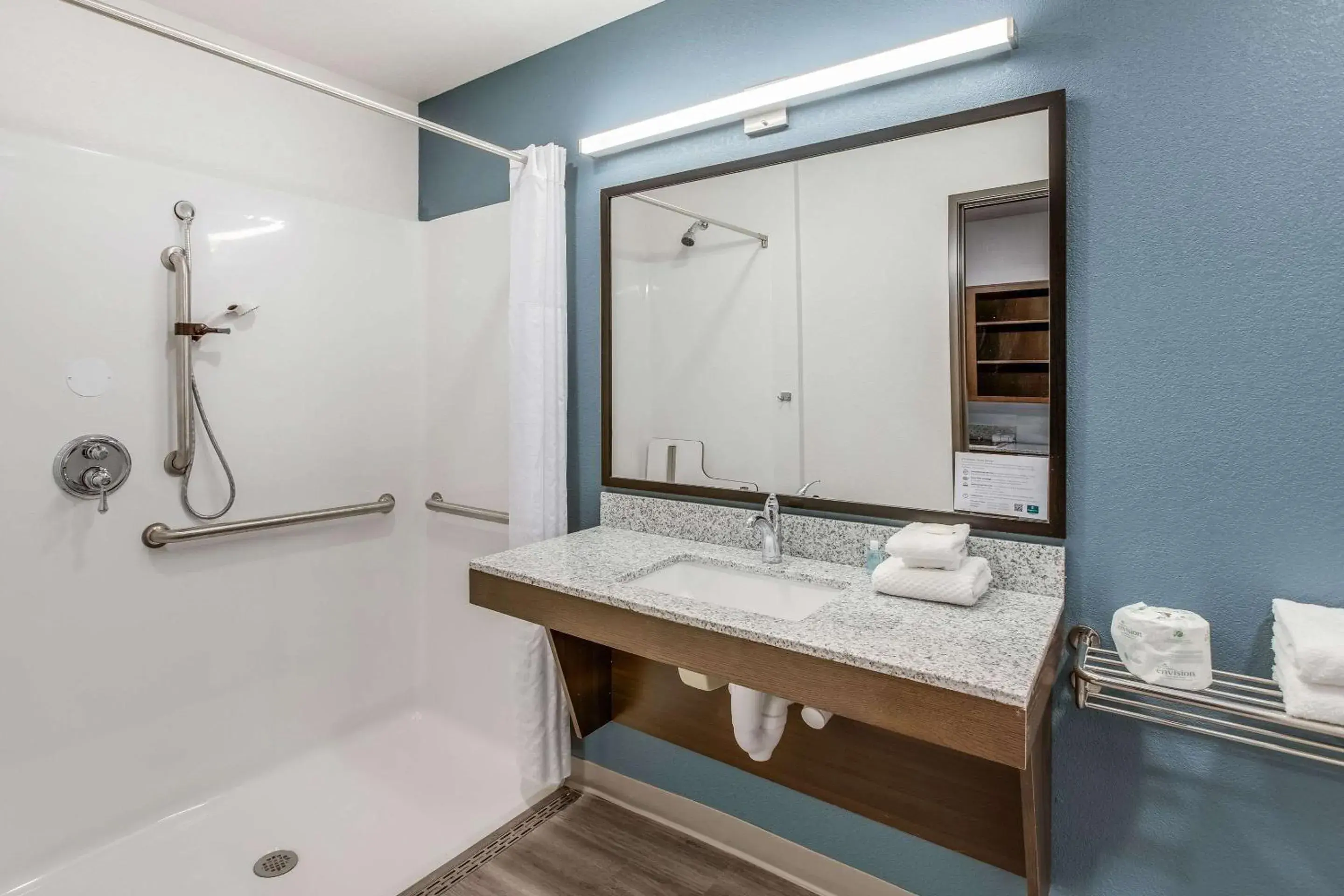 Bathroom in WoodSpring Suites Detroit Farmington Hills