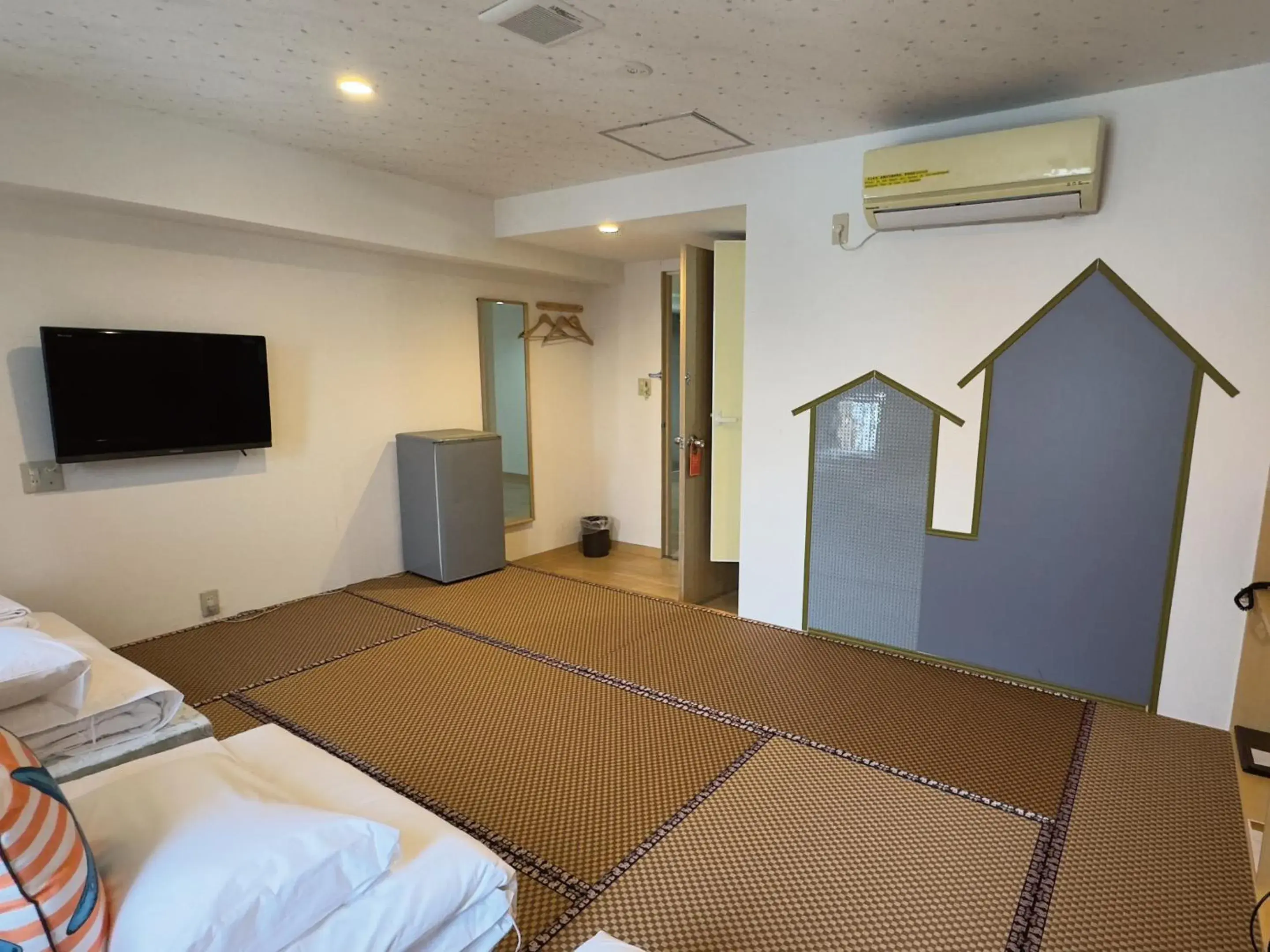 Photo of the whole room, Bed in Victoria Hotel Naha