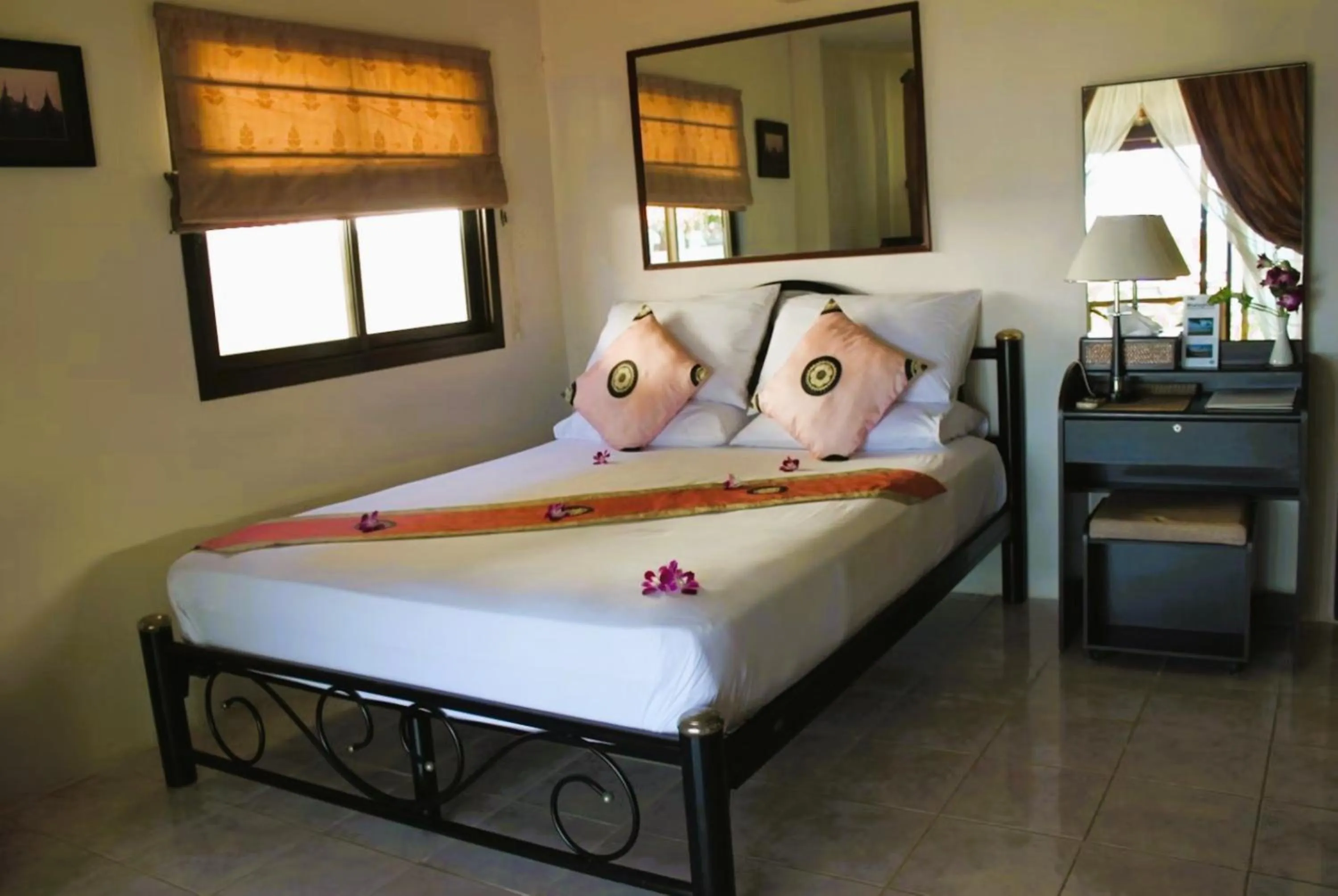 Bed in The Waterfront Hotel at Fisherman's Village