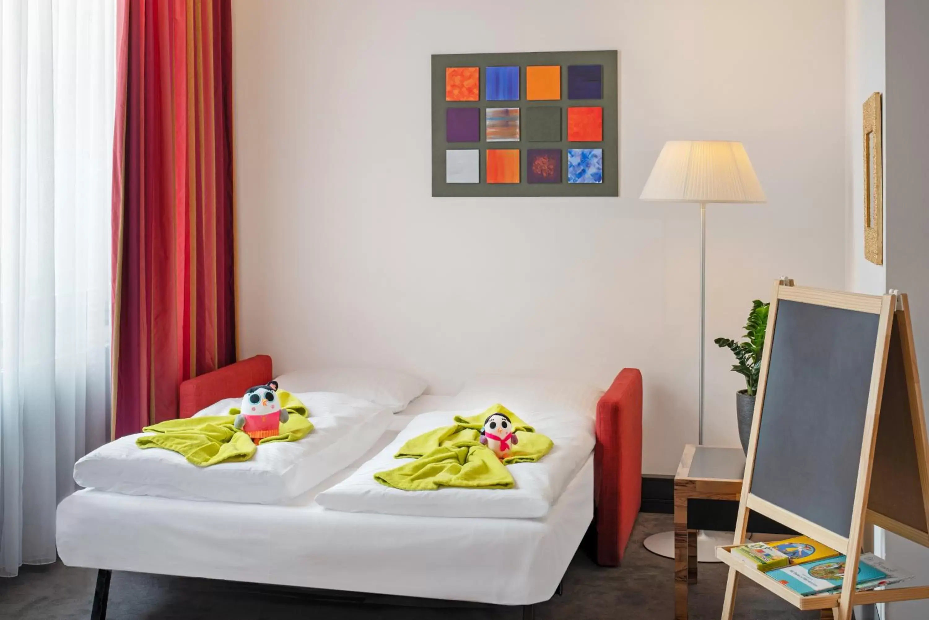 Bed in Mövenpick Hotel Berlin Am Potsdamer Platz Bed in Mövenpick Hotel Berlin Am Potsdamer Platz