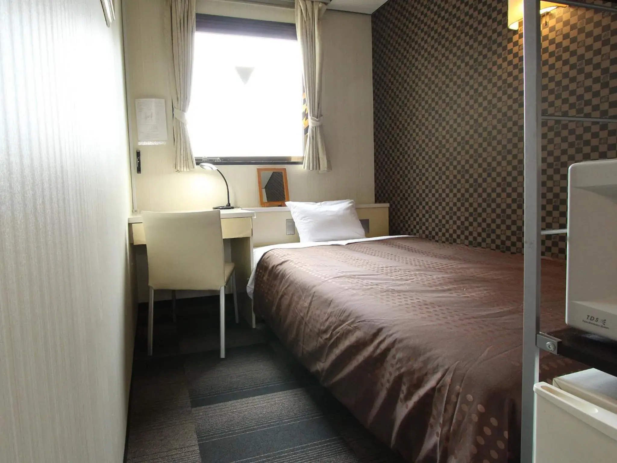 Photo of the whole room, Bed in HOTEL LiVEMAX BUDGET Shinosaka