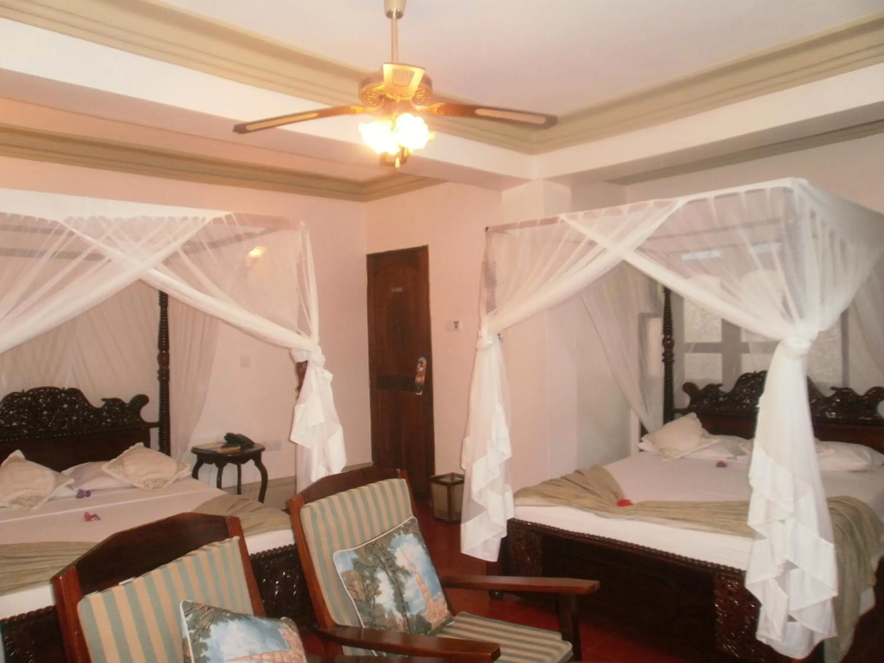 Photo of the whole room, Bed in Asmini Palace Hotel