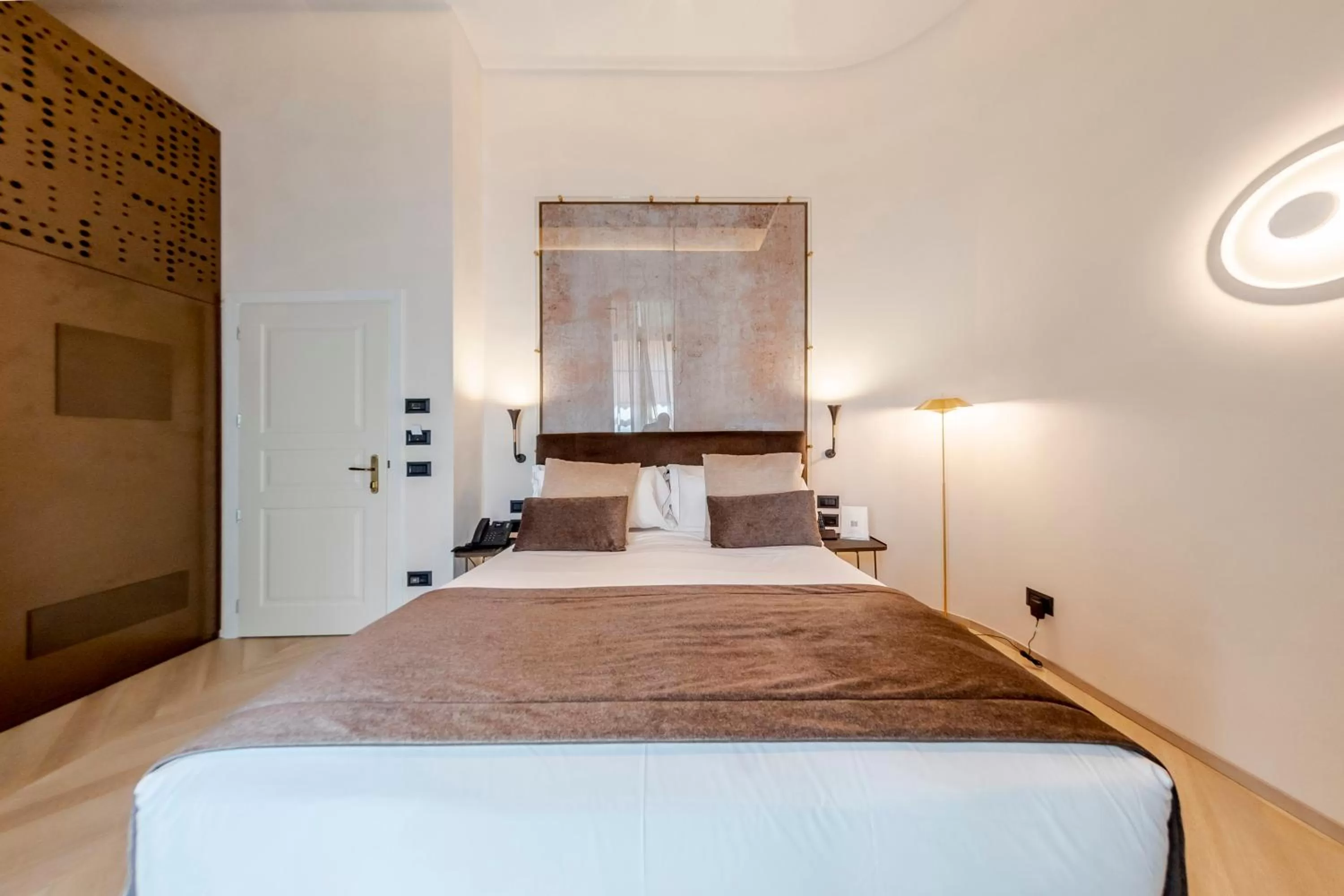 Bed in Martius Private Suites Hotel