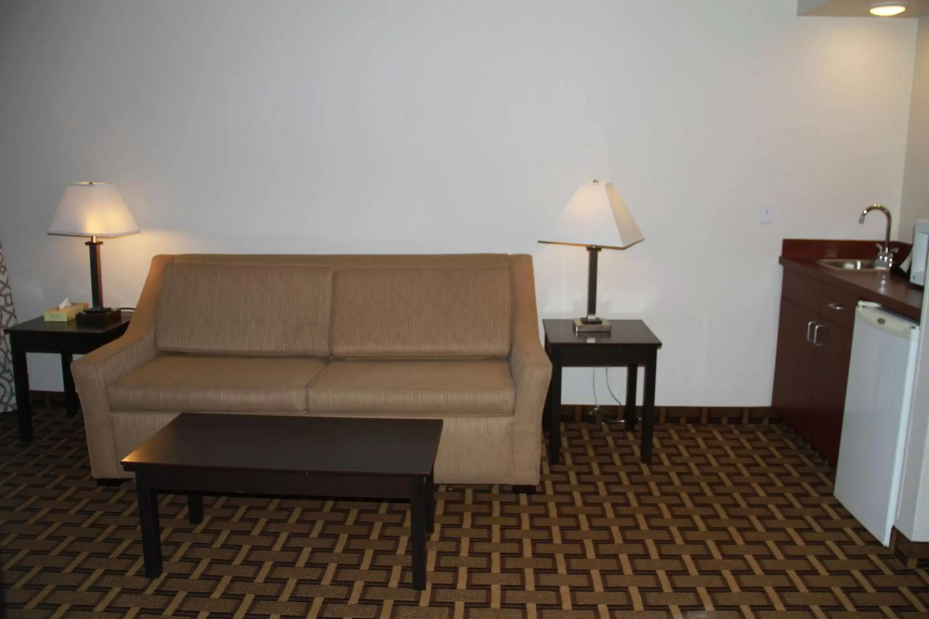 Photo of the whole room, Seating Area in SureStay Plus Hotel by Best Western Coralville Iowa City