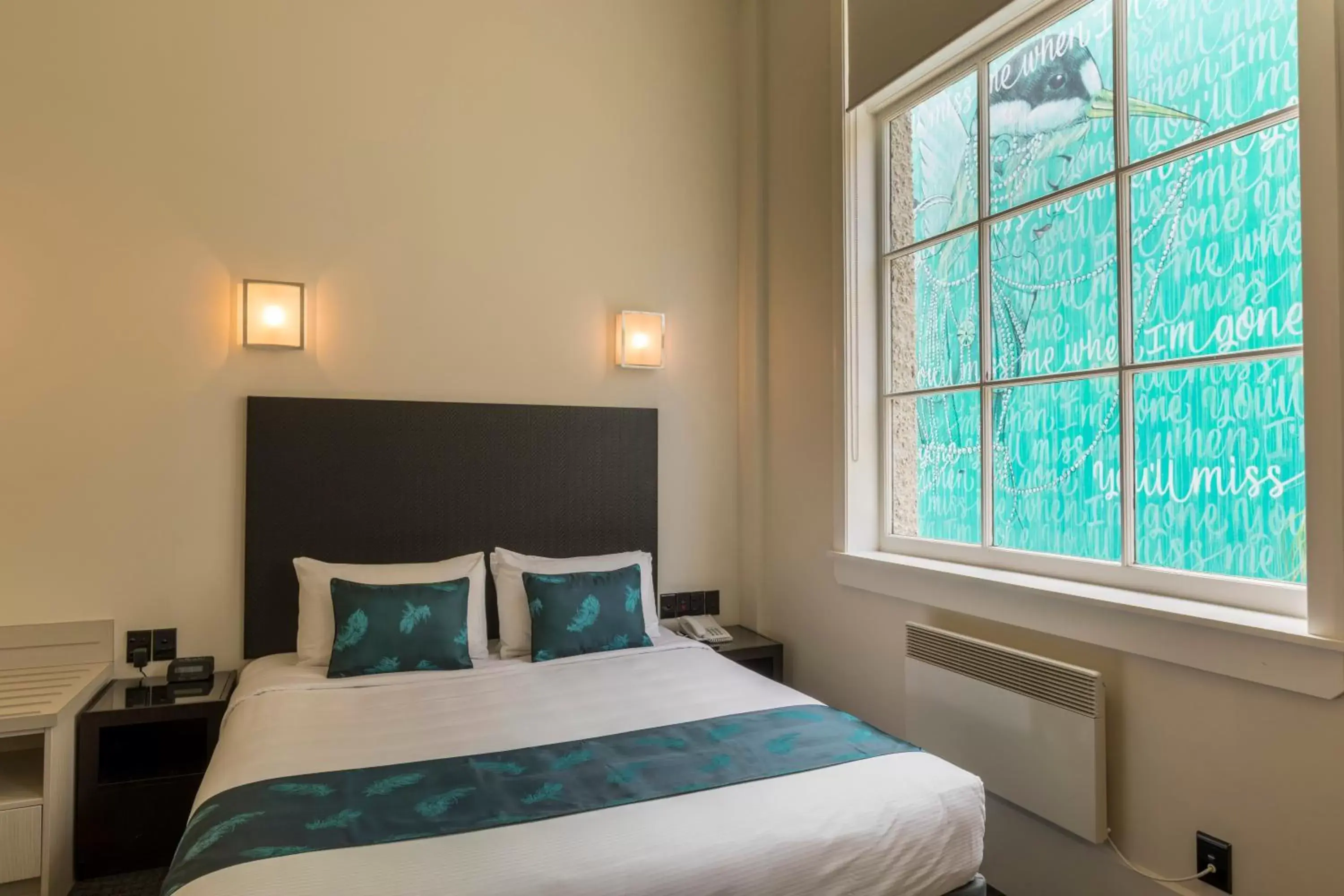 Bed in Quest Napier Serviced Apartments