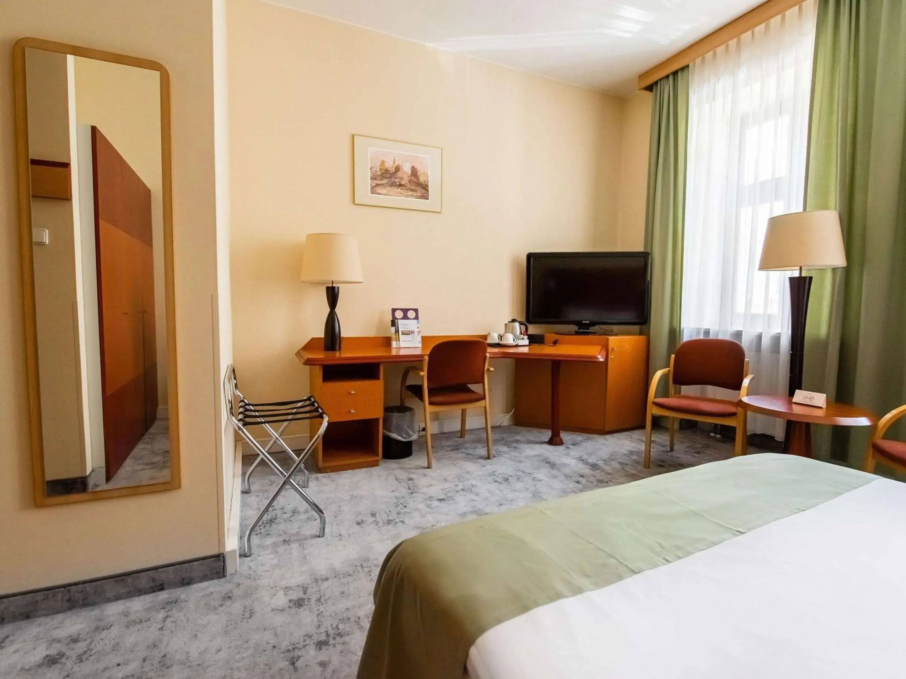 Bedroom, TV/Entertainment Center in Mercure Opole