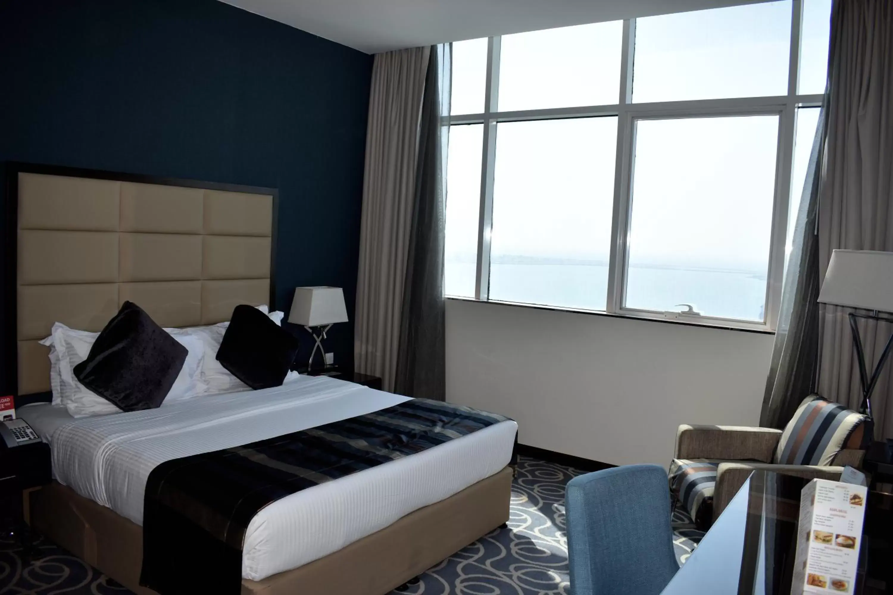 Sea view, Bed in Ramada Abu Dhabi Corniche